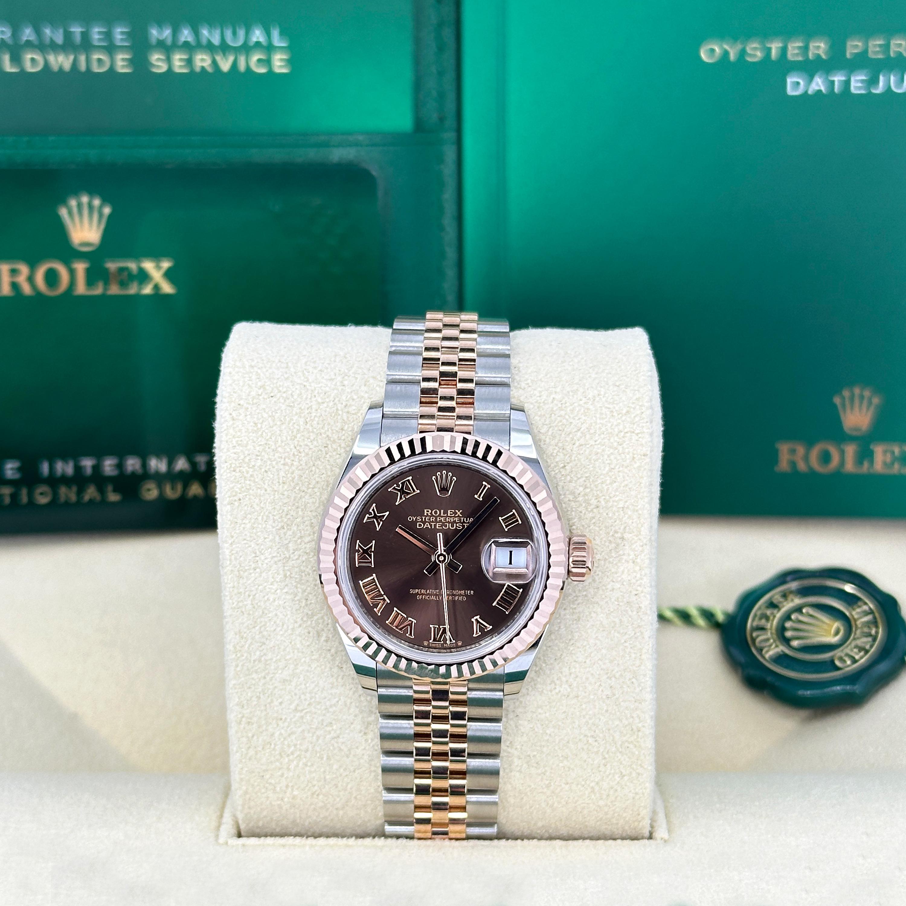 Rolex Lady-Datejust 279171-0009 – Everose Rolesor Elegance with Chocolate Roman Dial

The Rolex Lady-Datejust 279171-0009 masterfully blends refined femininity with Rolex’s signature precision, presented in a compact yet commanding 28mm case.