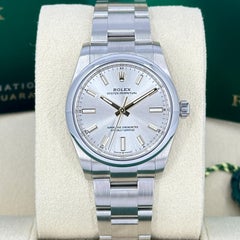 Unworn Rolex Oyster Perpetual 34 Reference# 124200, Complete set, 2025