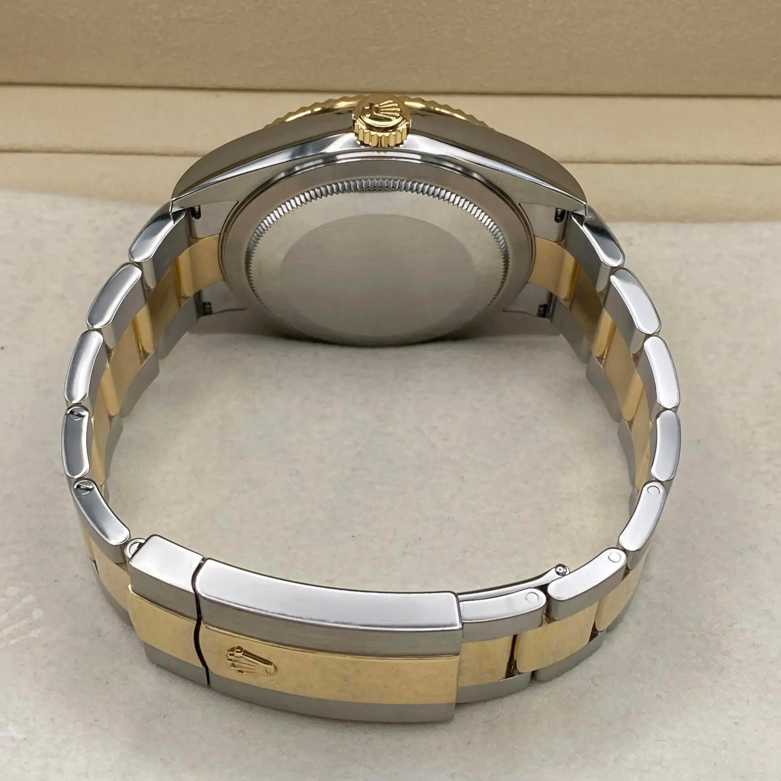 Unworn Rolex Sky-Dweller 336933 42mm Steel 18K Yellow Gold Black Dial Watch B&P For Sale 2