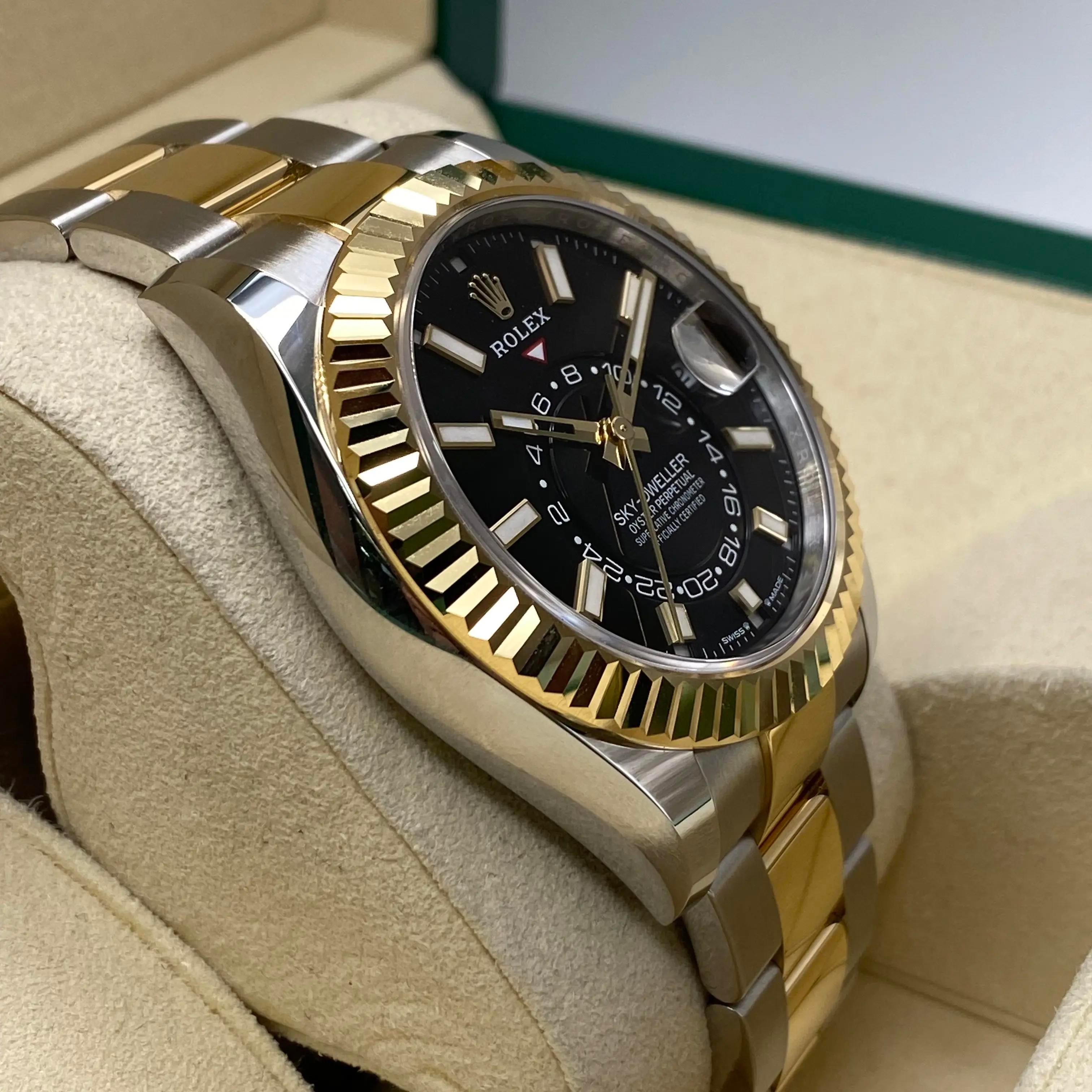 Unworn Rolex Sky-Dweller 336933 42mm Steel 18K Yellow Gold Black Dial Watch B&P For Sale 1