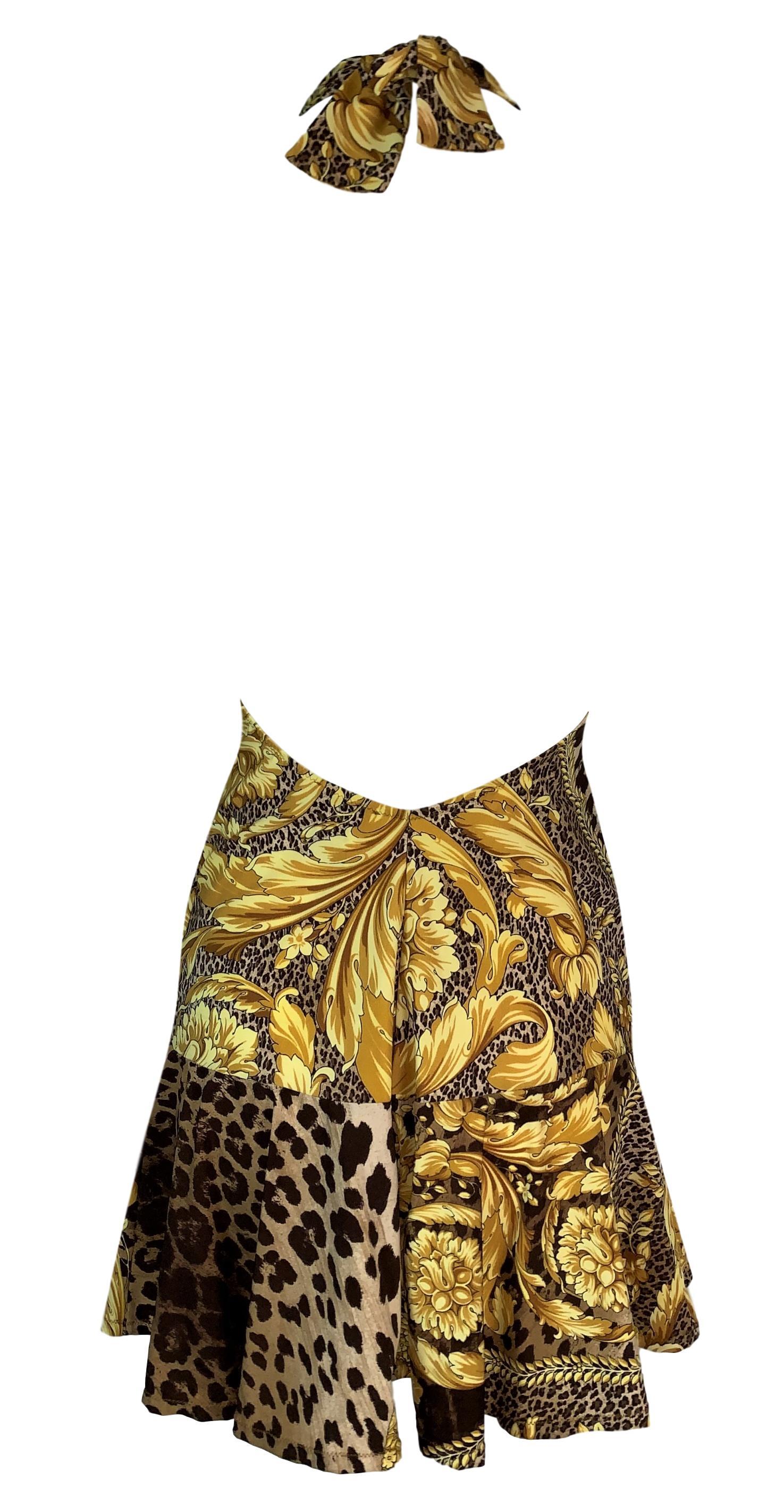 DESIGNER: S/S 2001 Versace

Please contact for more information and/or photos.

CONDITION: Unworn

FABRIC: Nylon & Spandex

COUNTRY MADE: Italy

SIZE: 40/S

MEASUREMENTS; provided as a courtesy only- not a guarantee of fit:

Chest: open, Waist: