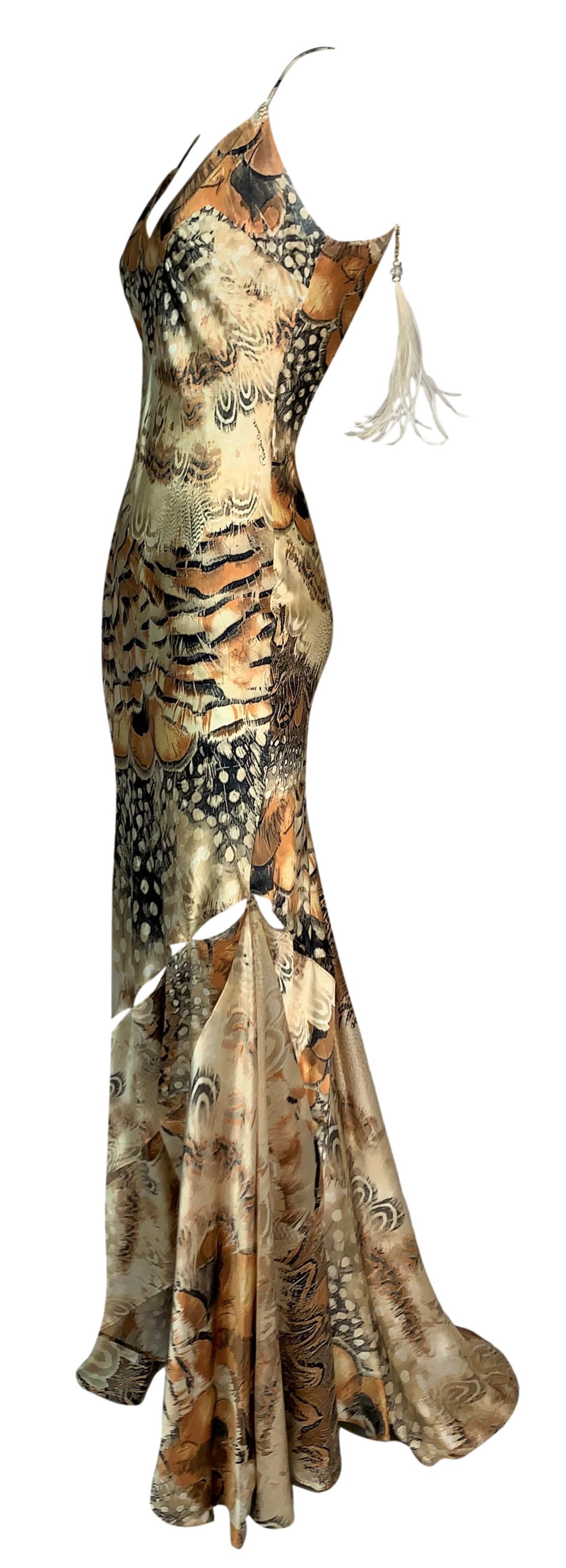 DESIGNER: S/S 2004 Roberto Cavalli

Please contact us for more images or information

CONDITION: Pristine/Unworn

FABRIC: Silk

COUNTRY: Italy

SIZE: M

MEASUREMENTS; provided as a courtesy only- not a guarantee of fit: 

Chest: 34-37