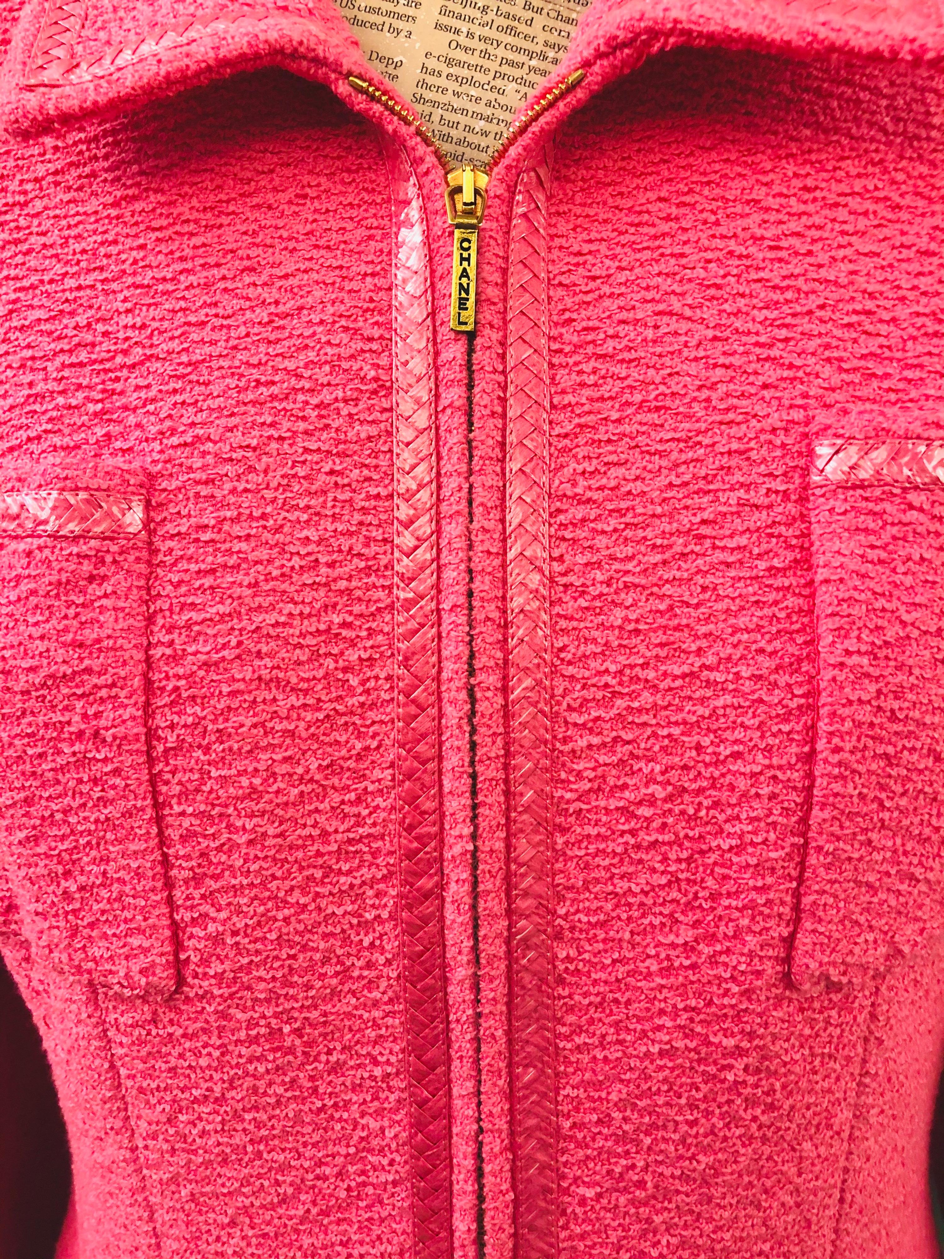 - Vintage Chanel pink tweed jacket from spring 1995 collection. 

- “Chanel’ gold hardware zip closure. 

- Four front pockets. 

- “CC’ gold hardware buttons. 

- Size 40 but fits like 38. (Altered). 

- Unworn with tag! 

- 61% Cotton, 24% Wool,