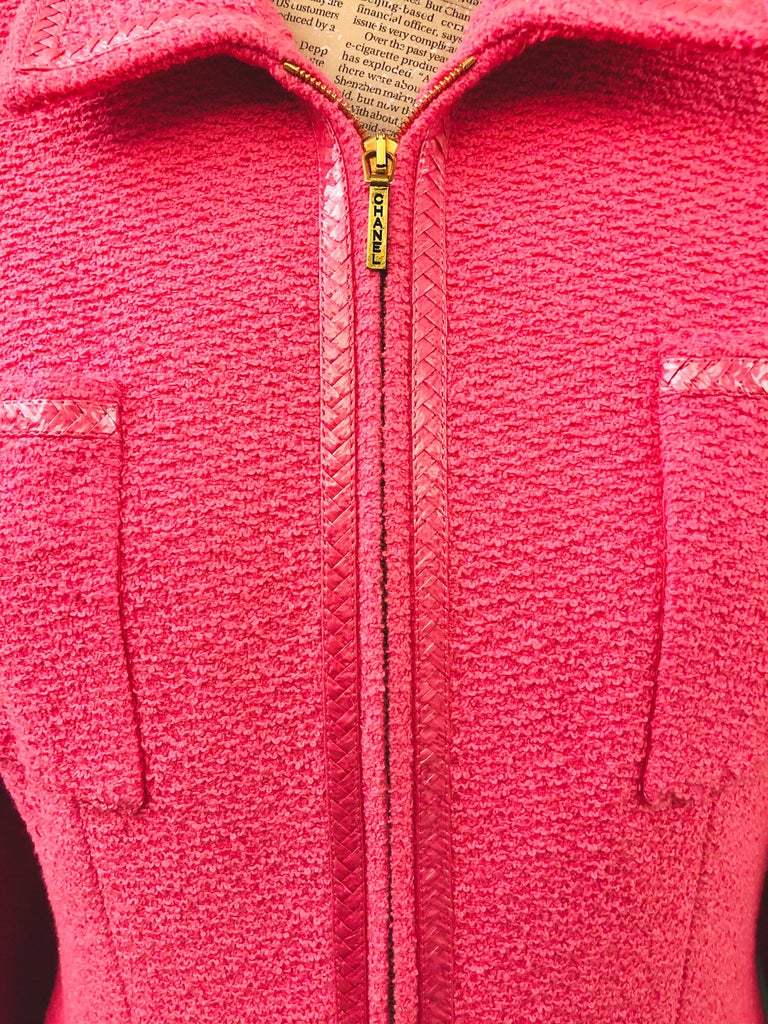 - Vintage Chanel pink tweed jacket from spring 1995 collection. 

- “Chanel’ gold hardware zip closure. 

- Four front pockets. 

- “CC’ gold hardware buttons. 

- Size 40 but fits like 38. 

- Unworn with tag! 

- 61% Cotton, 24% Wool, 15% Nylon. 