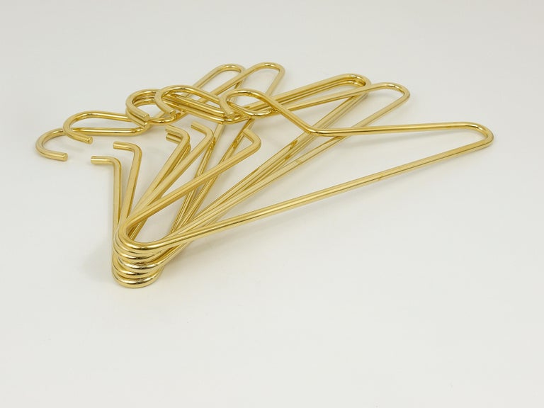 Up to 12 Austrian Modernist Solid GoldPlated Coat Hangers from the
