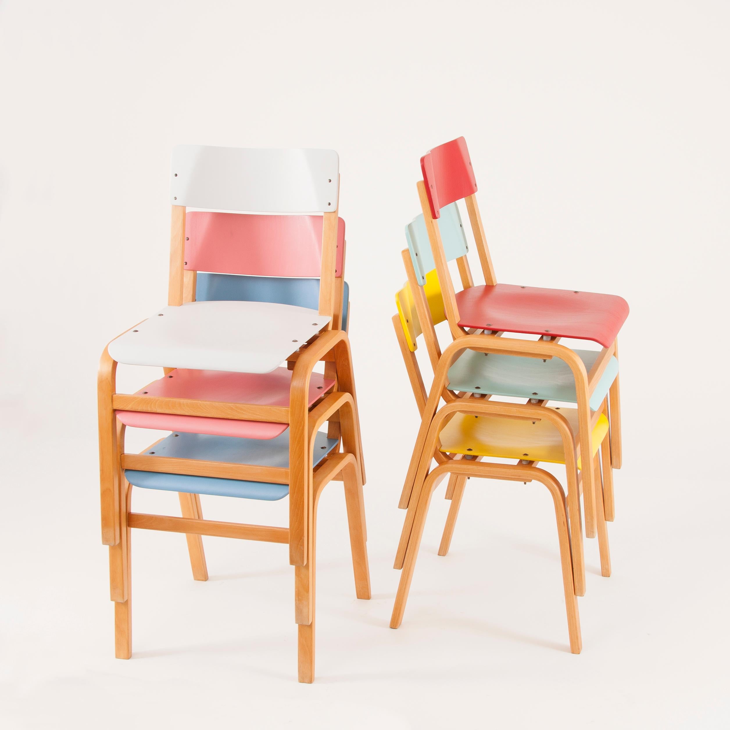 Up to 24 beautiful midcentury bentwood stackable chairs from the 1960s, executed by Ton / former Czechoslovakia. These chairs are professionally restored and in excellent condition. They are available in six different colors: yellow, red,