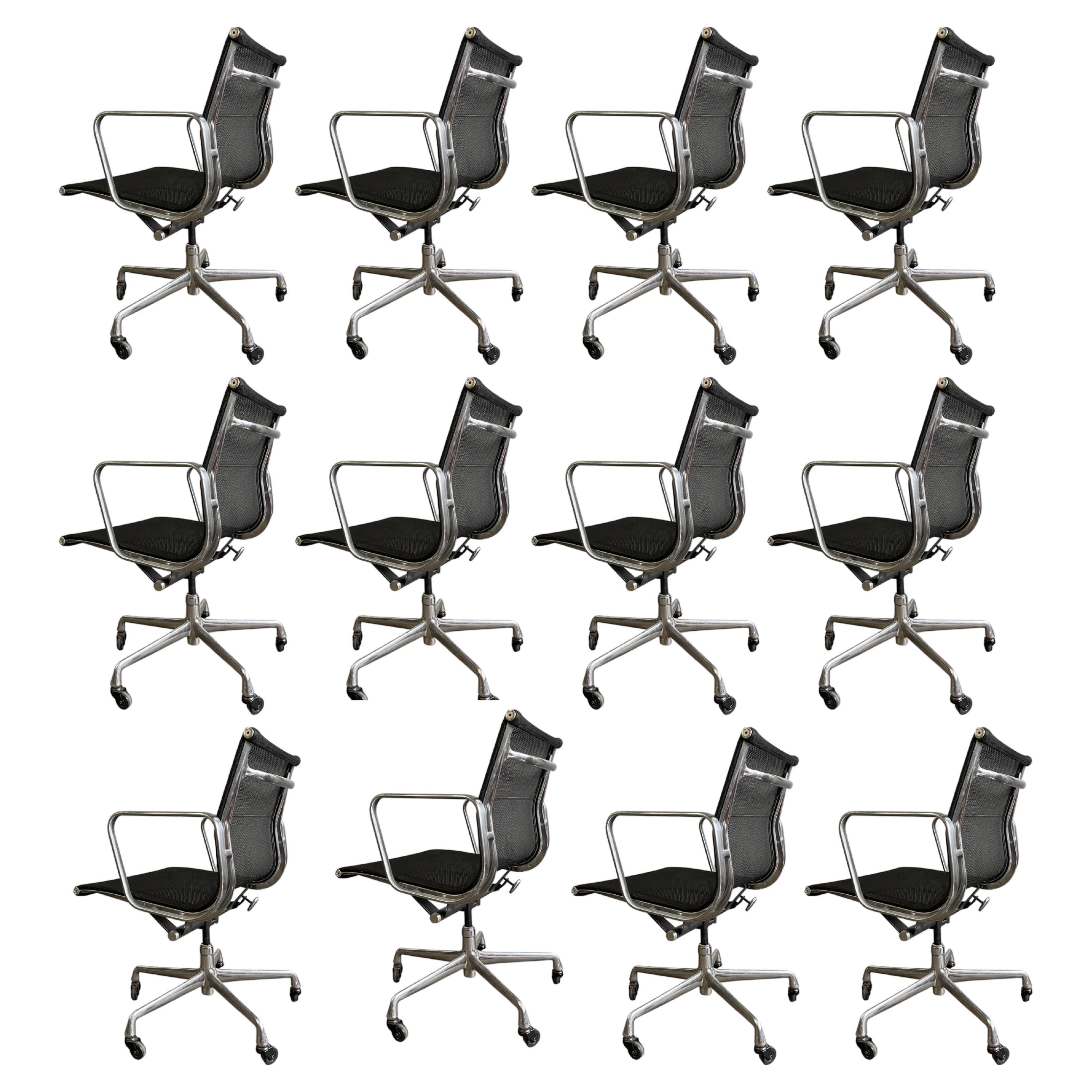 For your consideration are up to 40 Aluminium Group Management chairs in black mesh designed by Eames for Herman Miller. These are the most comfortable of all Eames aluminum Group chairs and have more of a Post-Modern look. All in very good original