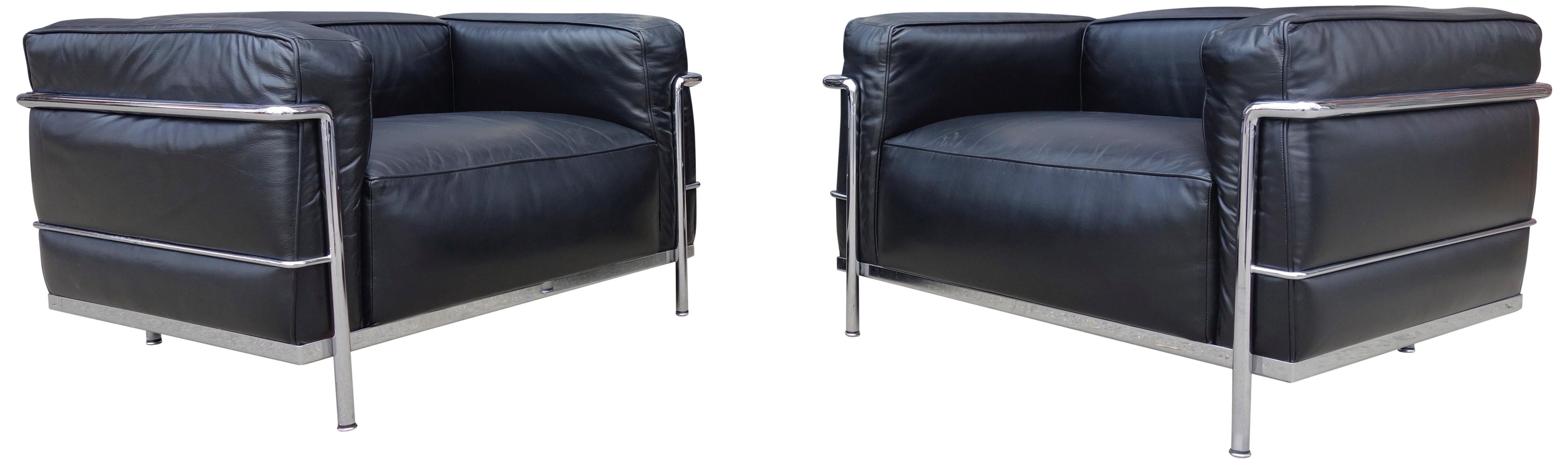 Created as a modernist response to the club chair and almost a century later, nothing has become more iconic then the LC3 Armchair. Featuring black leather with down filled cushions surrounded by a chromed tubular frame. Stamped on the frame Cassina