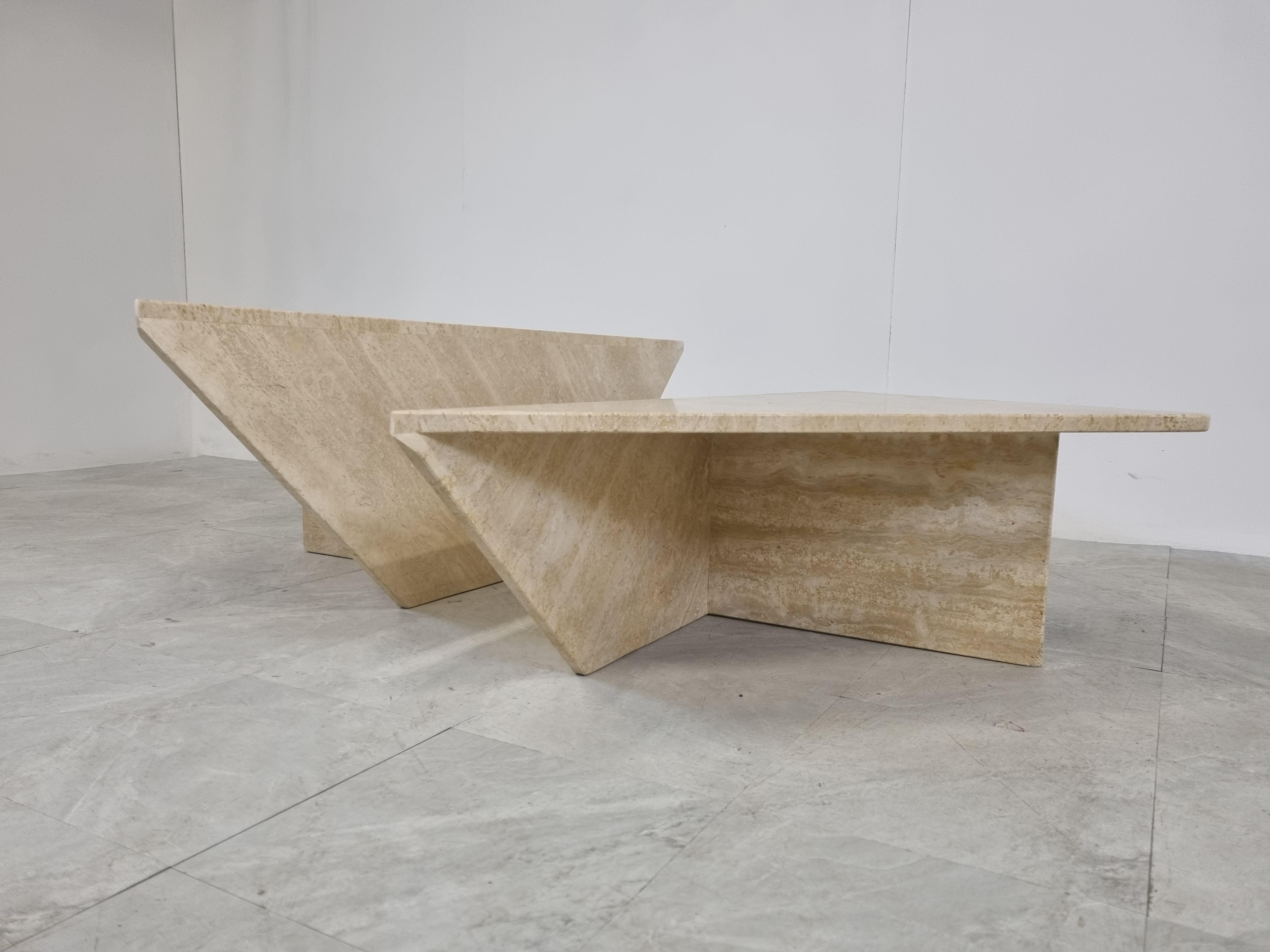 Pair of 1970s italian travertine stone triangular coffee tables by Up&Up.

Can be used as one table togheter or as two separate tables.

Good condition.

1970s - Italy

Dimensions:
Width x depth: 125cm/49.21
