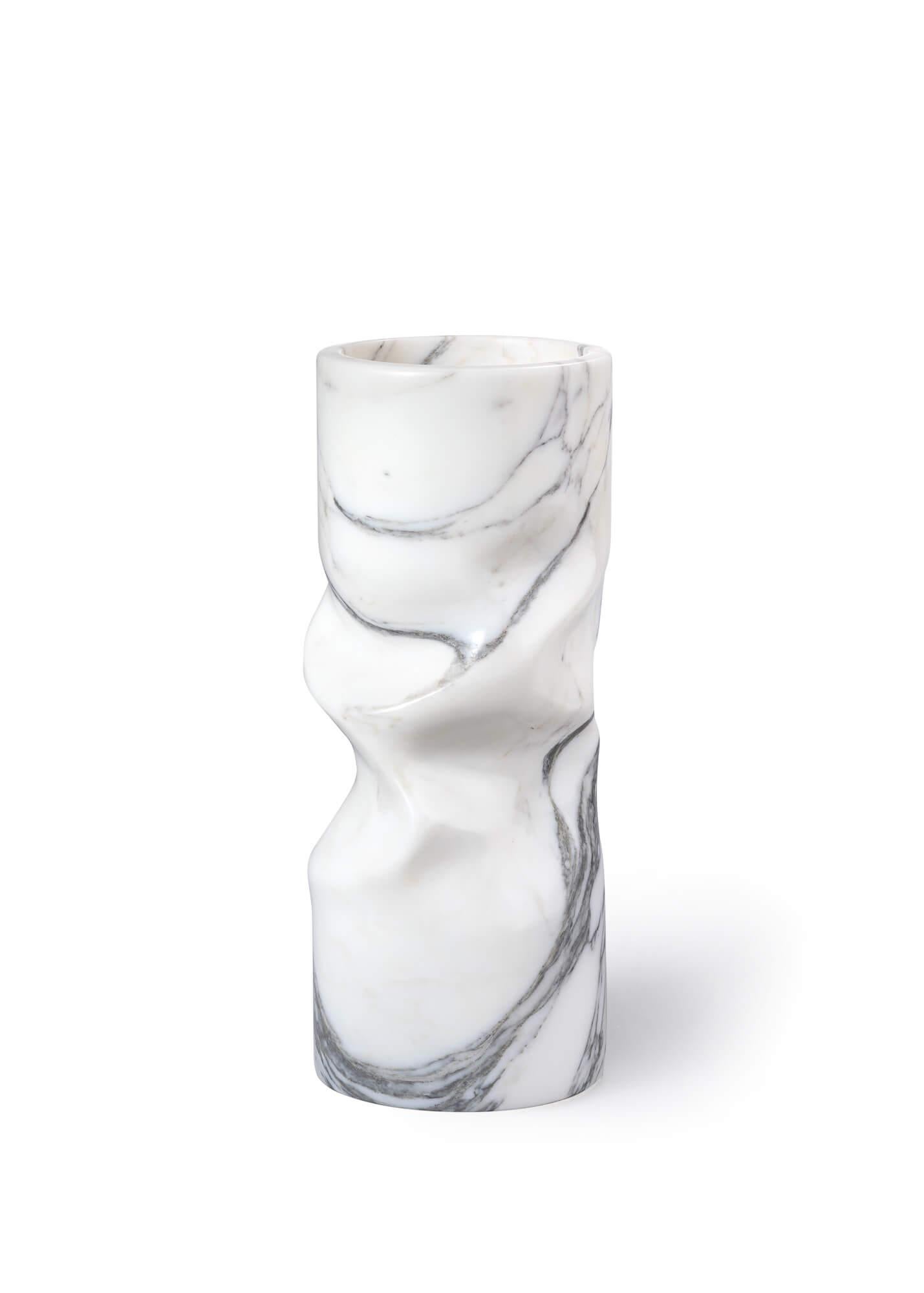 The Upcycled Marble Vase, available in a super-limited edition, presents a fusion of playful design and complex manufacturing methods, combining part machine and part handcrafting in a small workshop in Italy.

Distinctive in its crumpled shape,