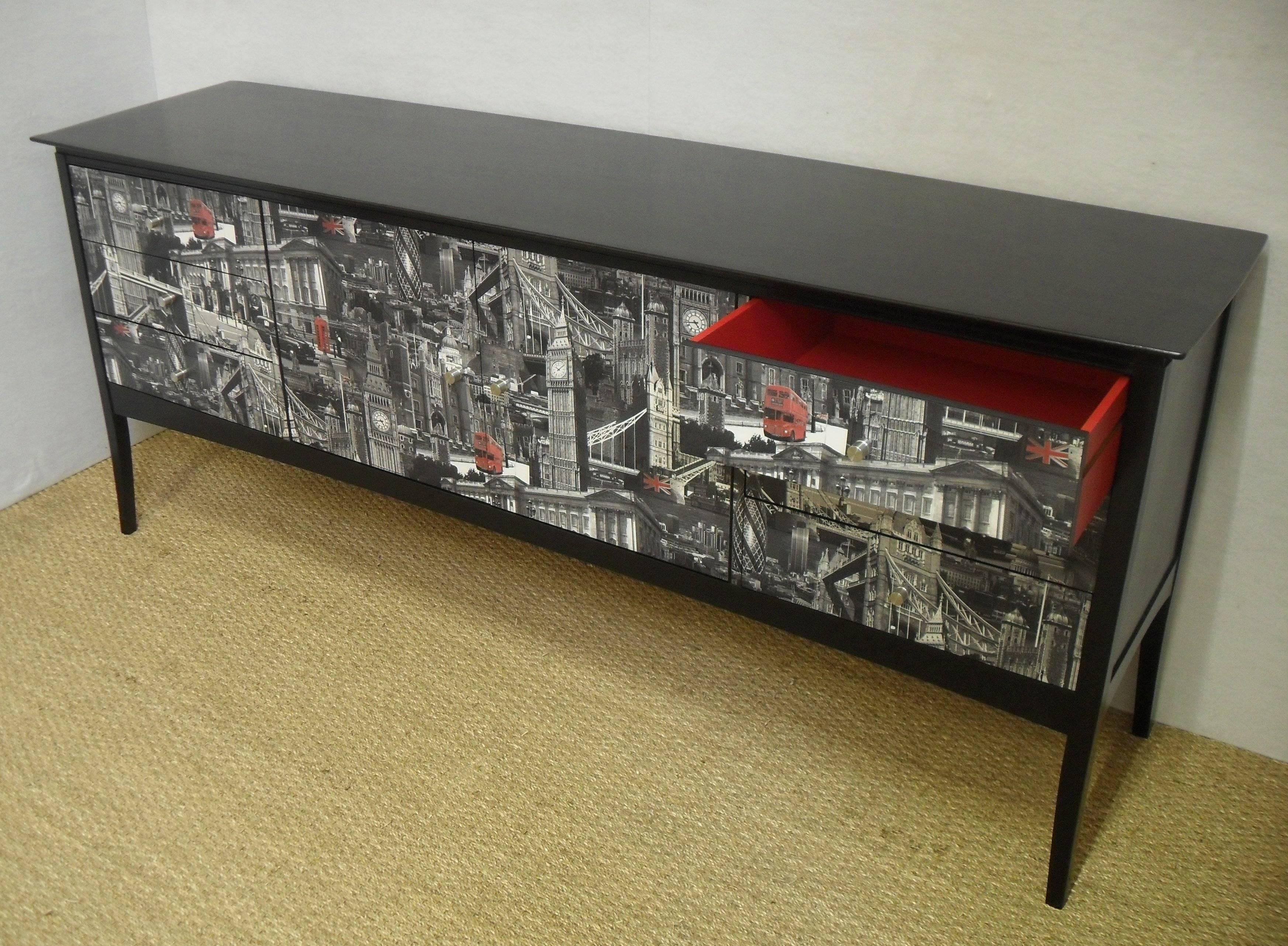 A stylish, 1970s upcycled sideboard based on the theme 'London'. The drawers and cupboard doors have all the famous London landmarks running through including, Buckingham Palace, Big Ben and Tower Bridge. Inside, the drawers and cupboard are painted