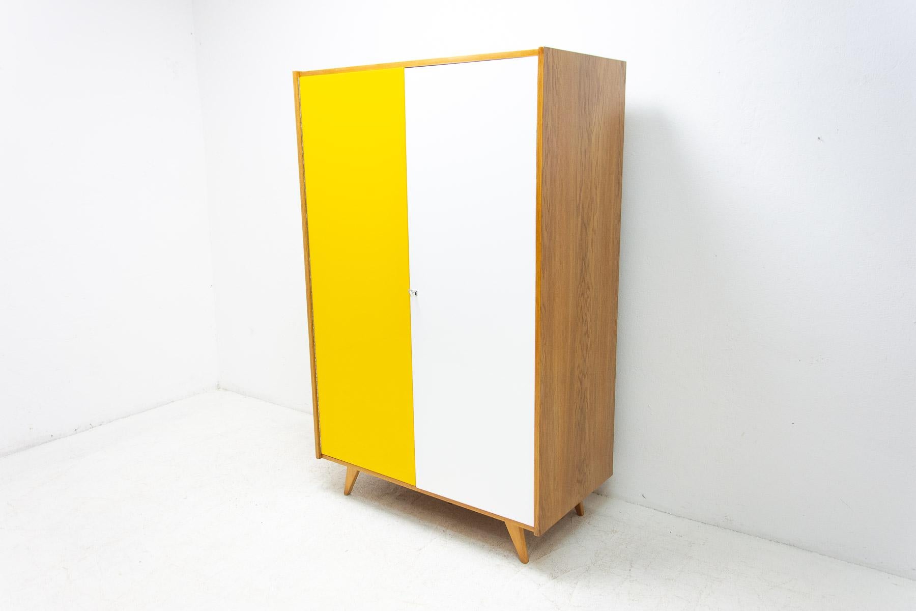 Mid-century wardrobe, catalogue No. U-450, designed by Jiri Jiroutek. It´s made of beechwood, veneer, plywood and laminate. In excellent condition, fully refurbished.

The cabinet comes from the famous Universal series (U-450), which was designed