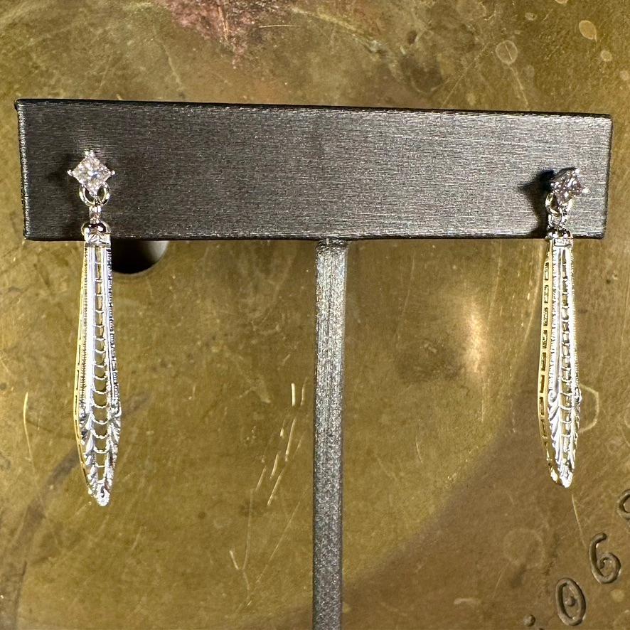 Whether you're being whisked away to a palace in the Scottish Highlands or settling in with a bag of crisps to binge The Crown, this beautiful set of art deco style earrings will elevate any outfit for any occasion. The architectural dangles were