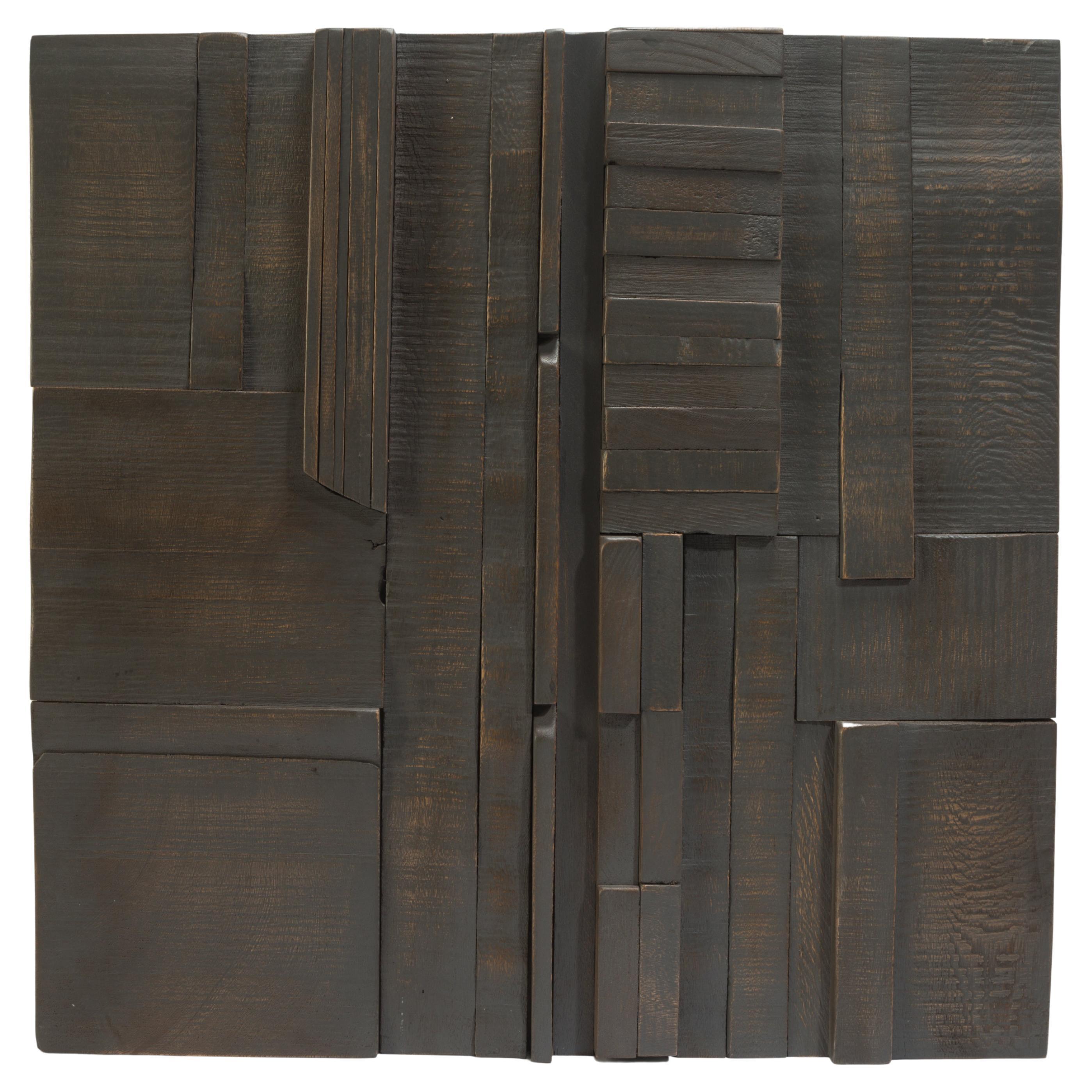 These CHARCOAL collage tiles are composed randomly from recycled wood remnants and when installed bathe any space with a warm feeling and texture which is meditative, sanded to a soft finish and protected with lacquer and wax. The works convey an