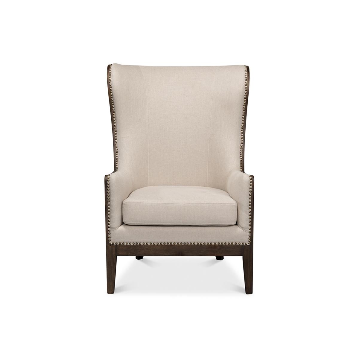 Updated Modern classic wingchair, covered in linen to make it neutral and easily placed in any environment. The real drama comes into focus when viewing the exposed ash construction elements on the exterior. Perfect comfort and incredible beauty on