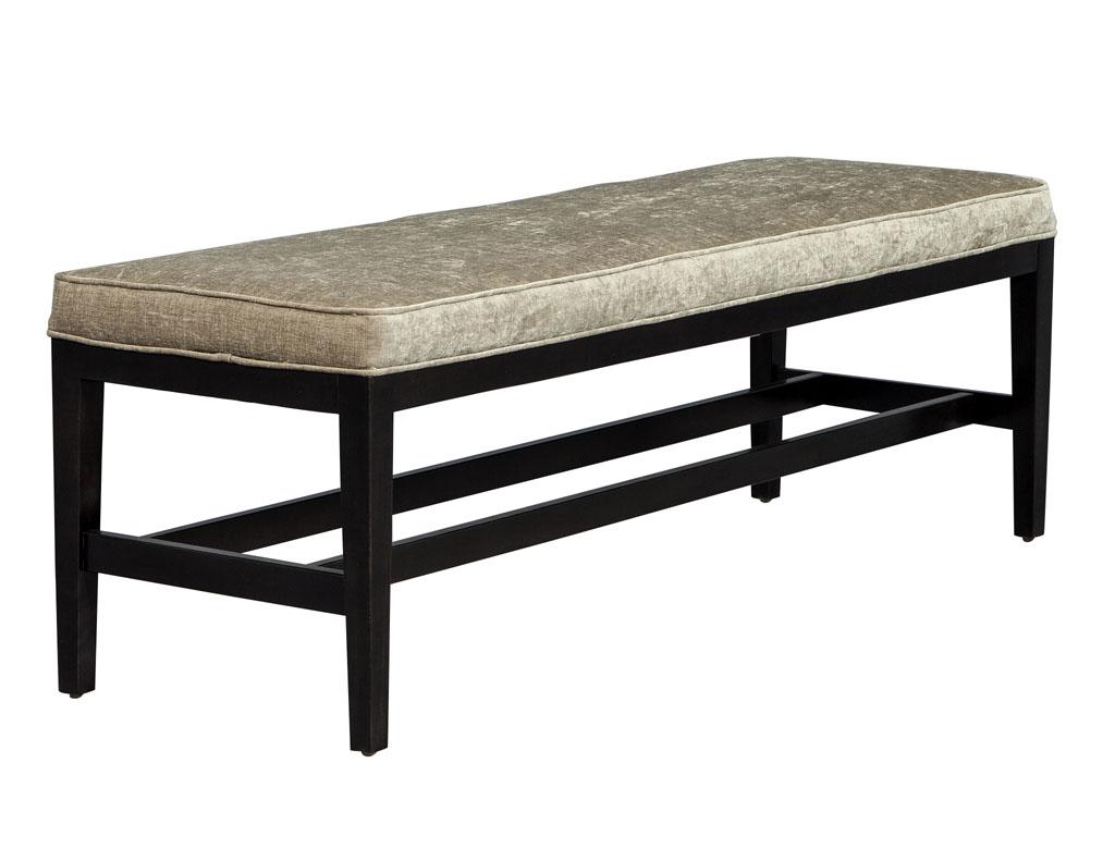 Upholstered accent lounge bench is part of the Carrocel Custom collection. Made of solid maple and upholstered in a neutral velvet. This bench is not only versatile and useful, but also stylish. Its sleek design makes this bench the perfect piece