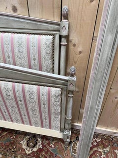 Upholstered and painted Louis XVI style bed