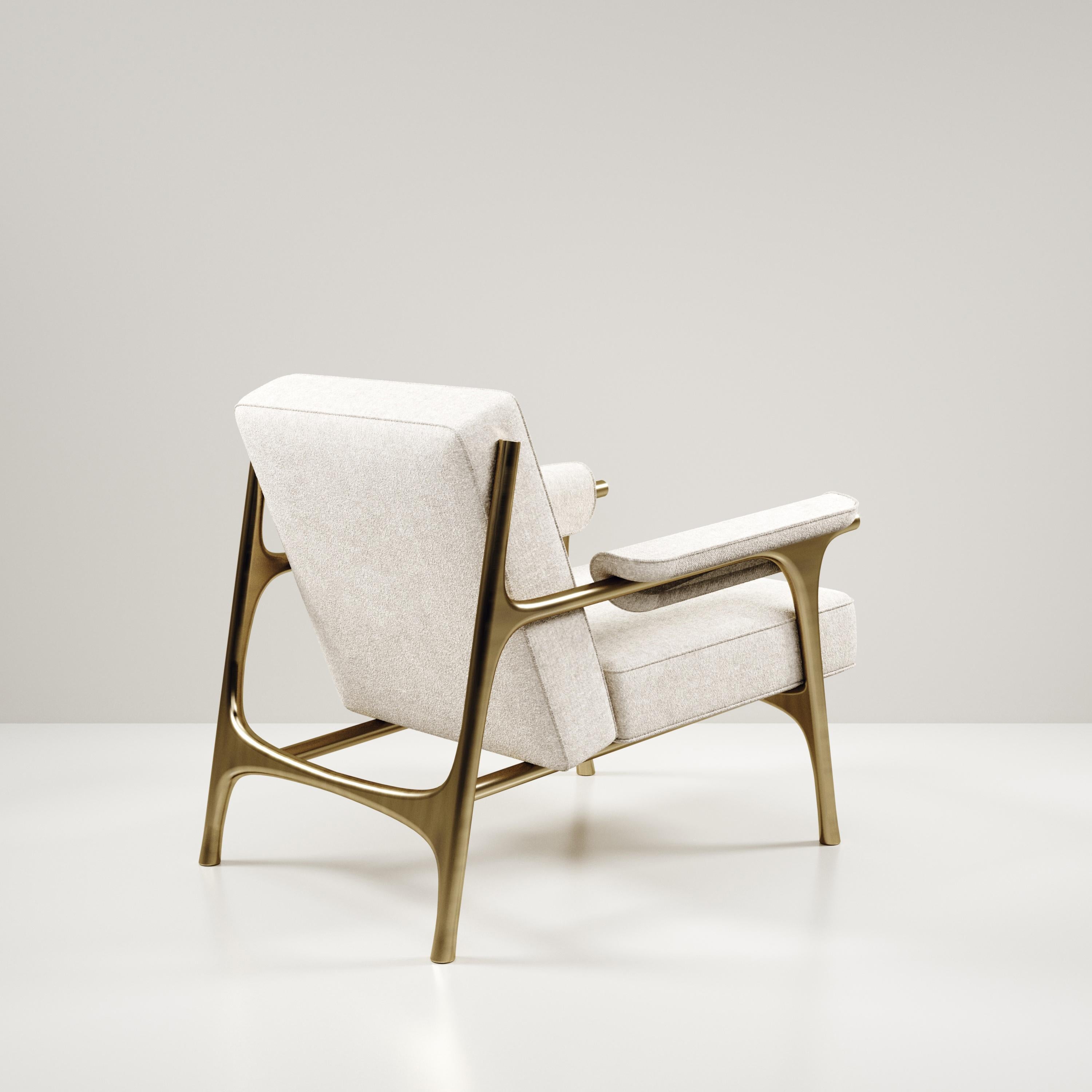 Upholstered Armchair and Footstool with Brass Details by R&Y Augousti In New Condition For Sale In New York, NY