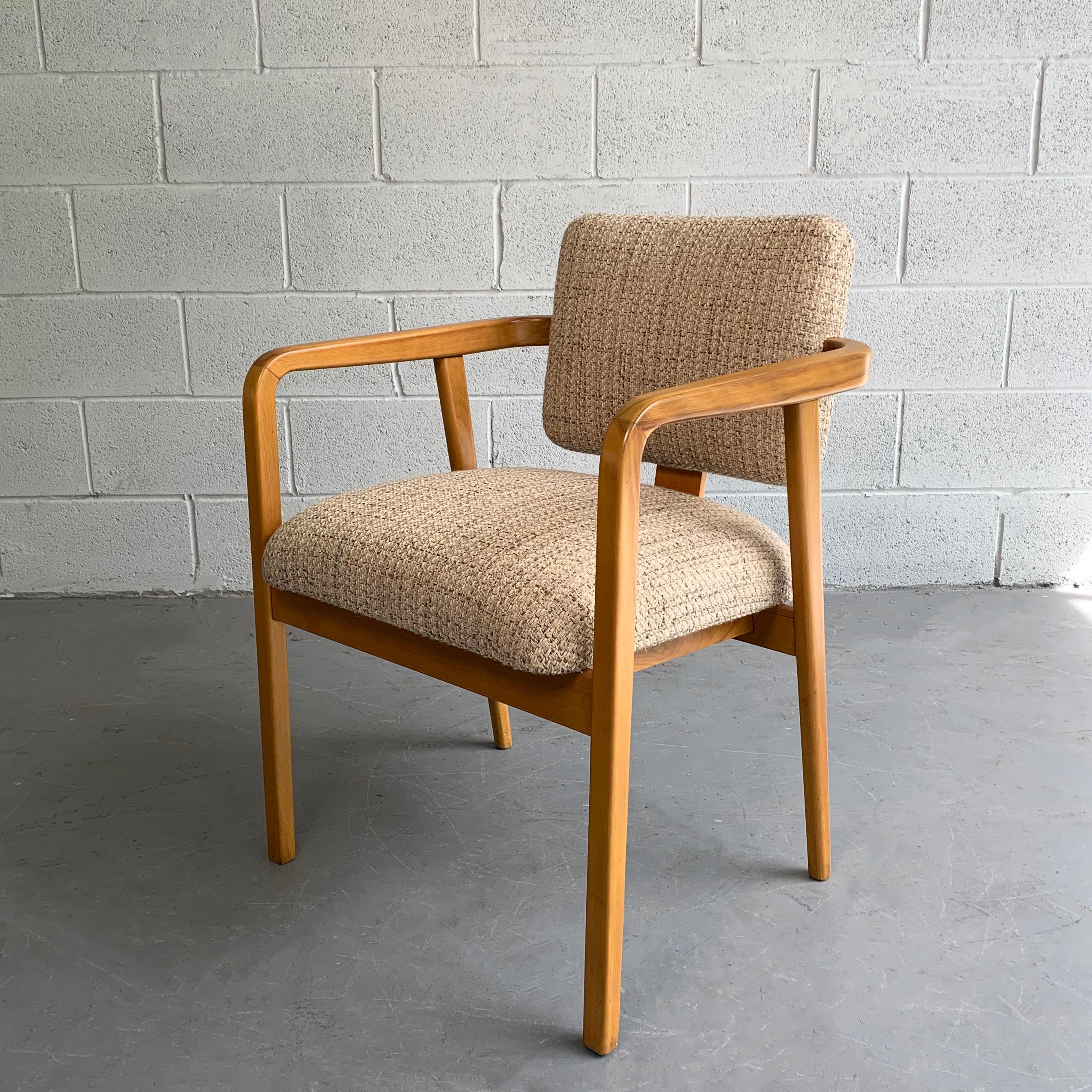 Mid-Century Modern armchair by George Nelson for Herman Miller features a maple frame with upholstered seat and back.