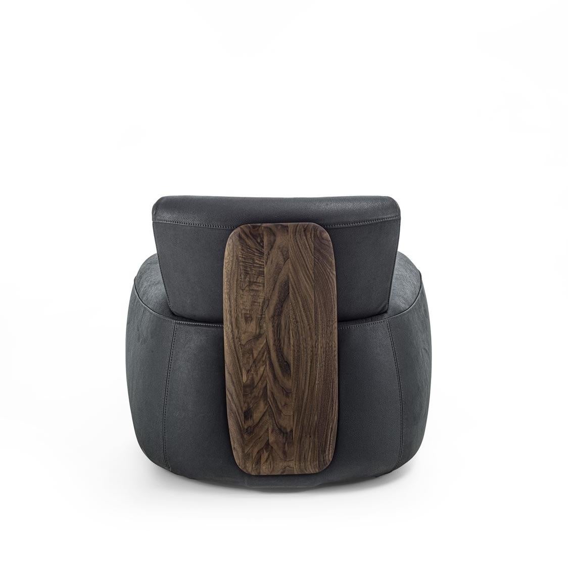 Italian Upholstered Armchair with a Distinctive Solid Wood Backrest For Sale
