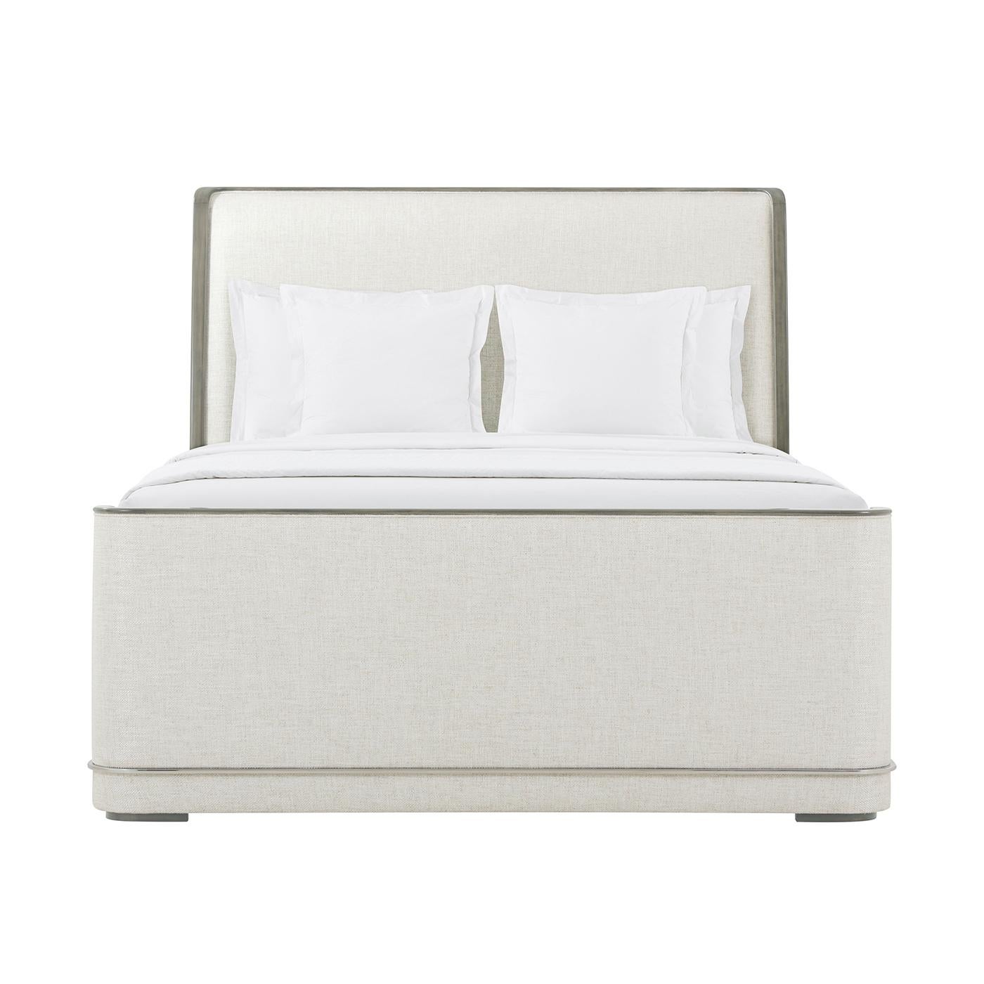 This elegant piece features graceful curves and slender maple and stainless steel accents, combining to create a design that exudes timeless elegance. The bed is upholstered in a luxurious fabric, providing a soft and welcoming touch.

The