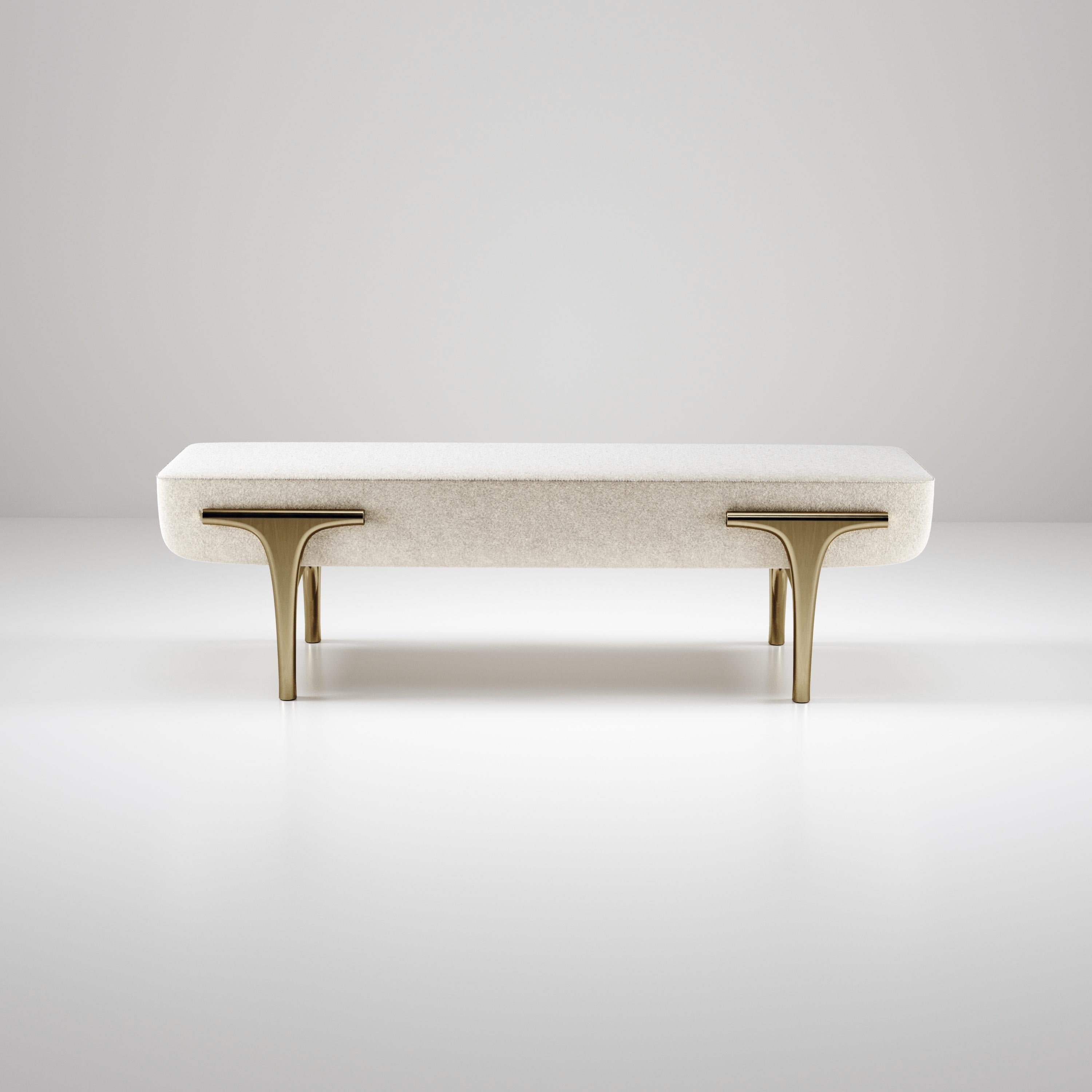 The Ramo bench by R & Y Augousti is an elegant and versatile piece. The upholstered piece provides comfort while retaining a unique aesthetic with the bronze-patina brass frame and details. This listing is priced for COM supply by client, see other