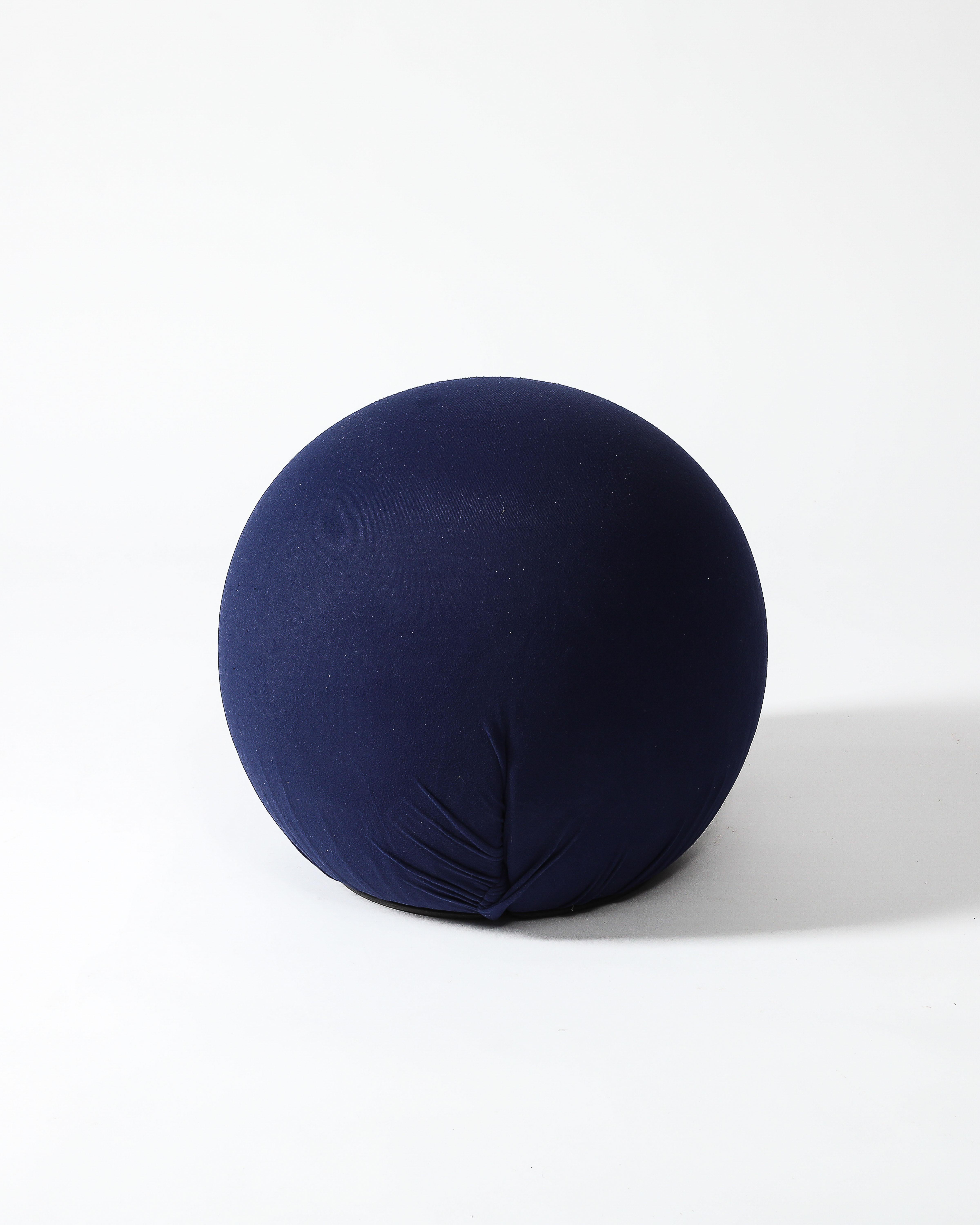 Blue, upholstered pouf by Baleri Italia.