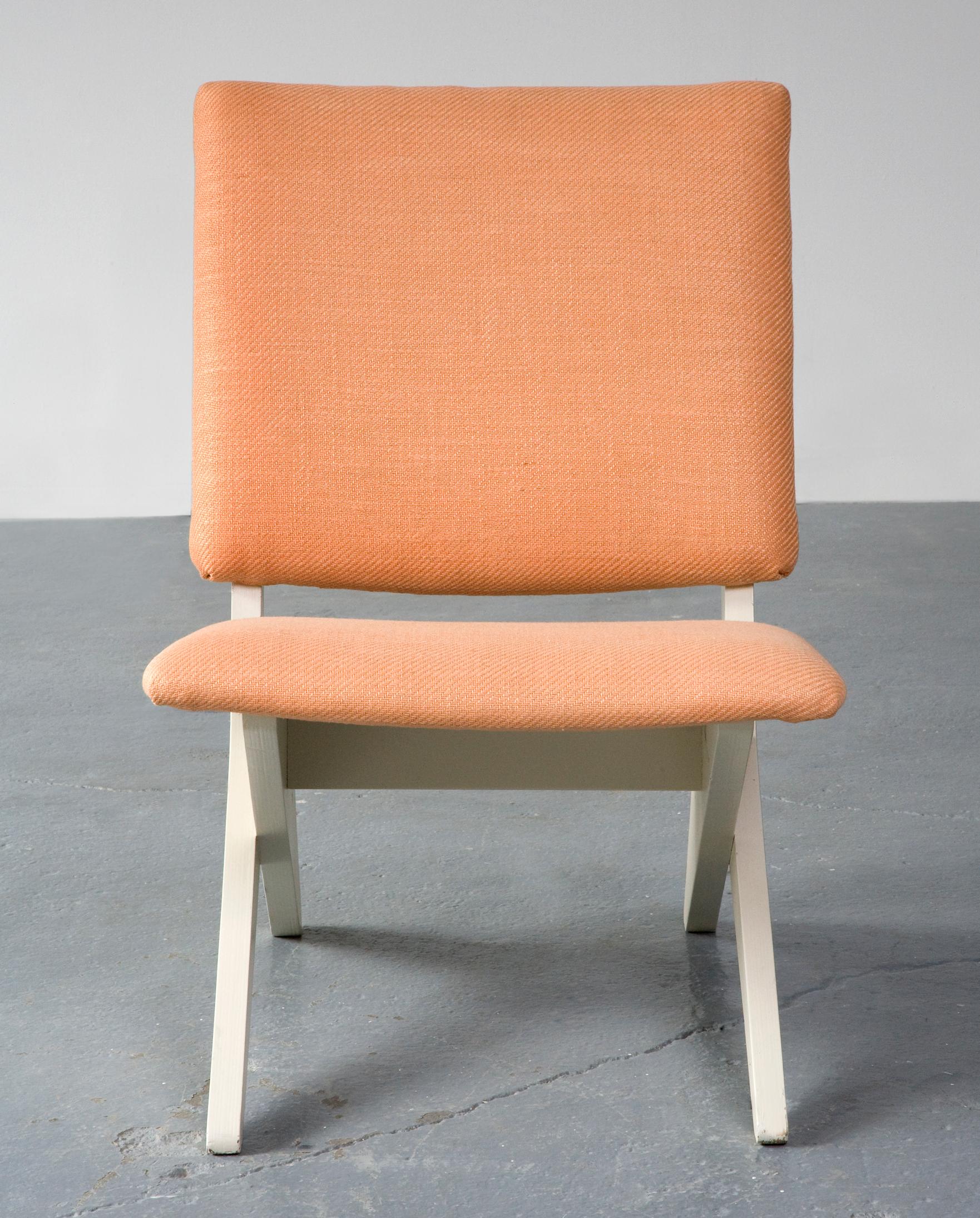 Upholstered chair on a sculptural plywood base. Designed by Peter van Grunsven for UMS-Pastoe, Holland, 1958.