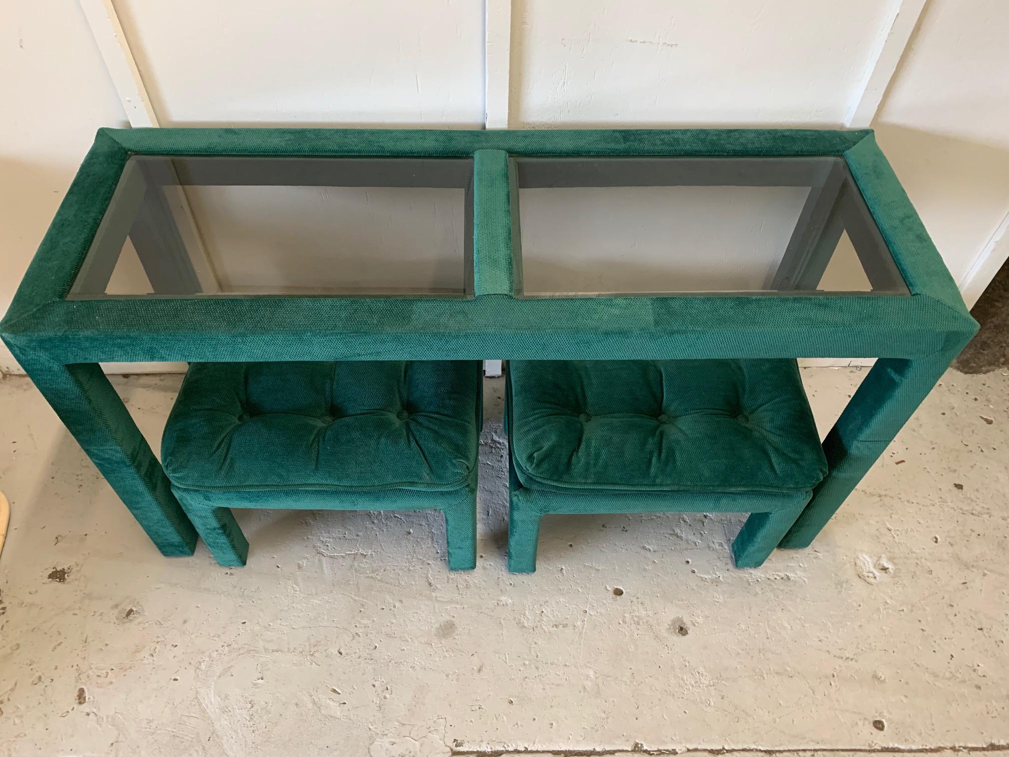 Unique upholstered console table features glass inserts and matching upholstered foot stools. Stools can be used as ottomans or benches as well. Very good condition with only very minor imperfections consistent with age.  T7878