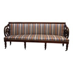 Upholstered Charles X Mahogany Sofa on Casters, 19th Century