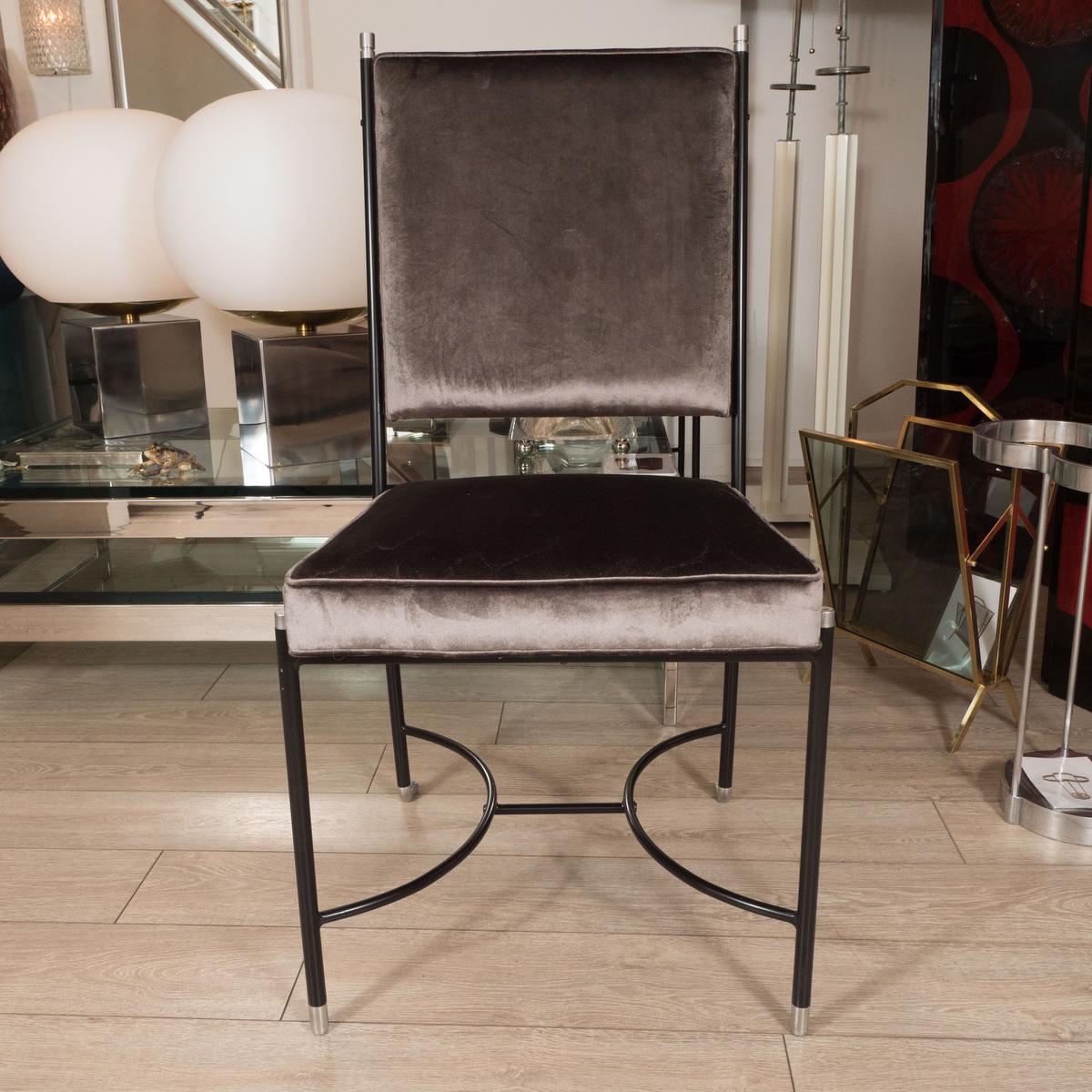 Upholstered desk chair with stylized blackened metal frame by Luigi Caccia Dominioni. 