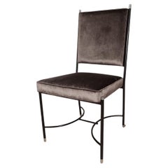Vintage Upholstered desk chair with stylized blackened frame