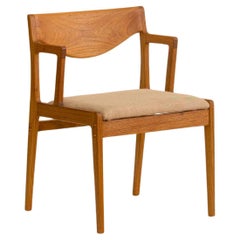 Upholstered dining chair in Brazilian Hardwood by Ricardo Graham