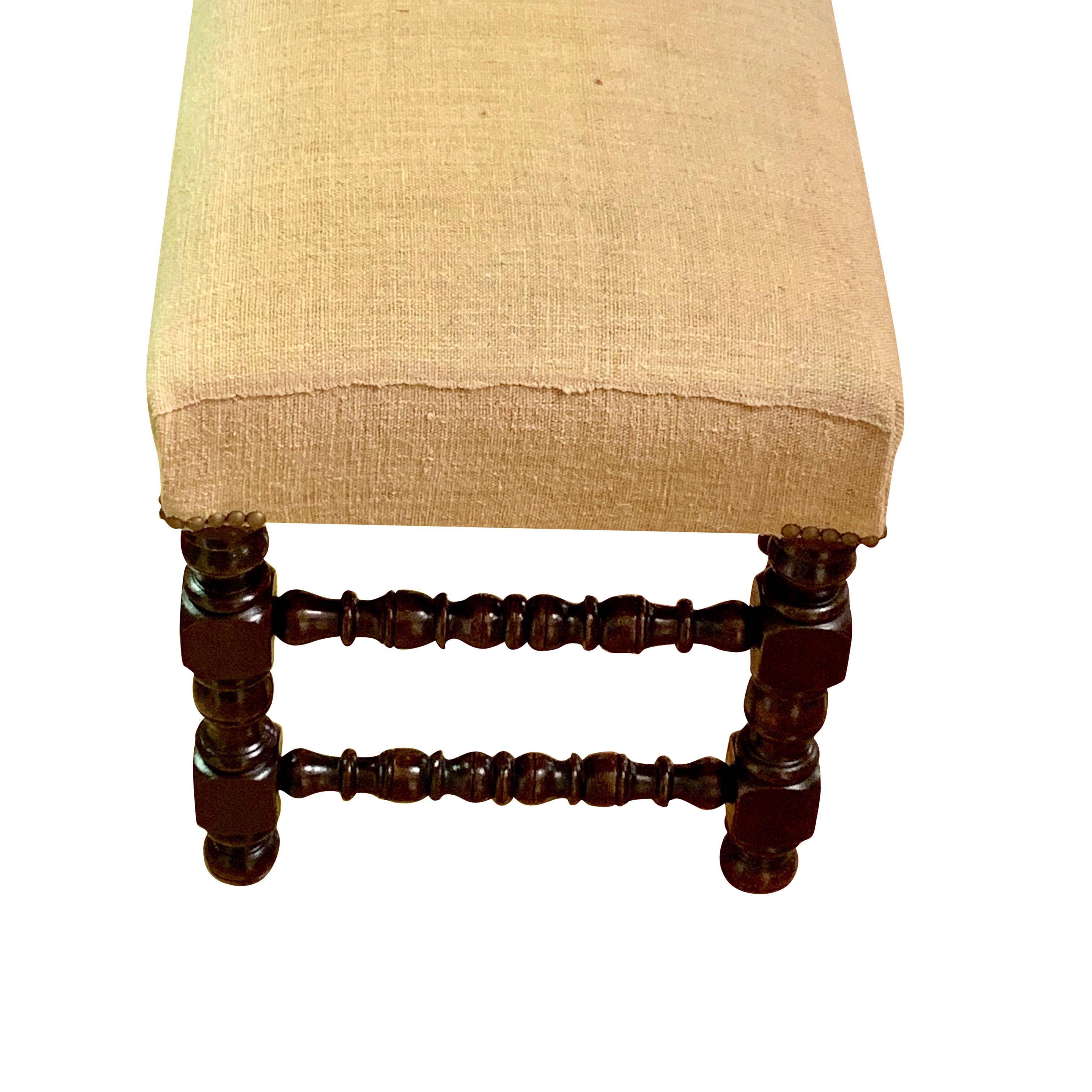 19th century French foot stool with traditional turned legs
Newly reupholstered in vintage homespun Belgian linen
