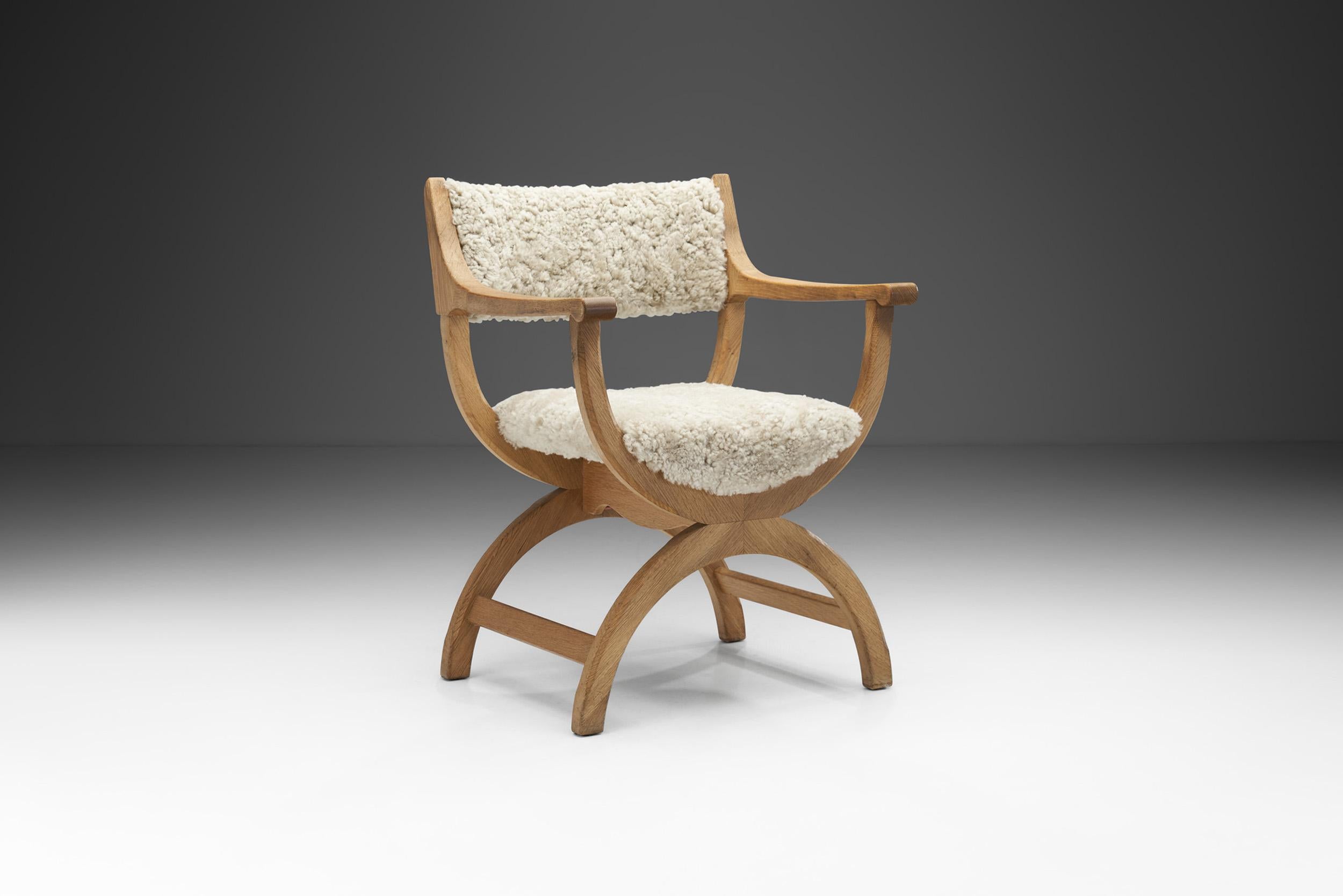 Designed by Henning Kjaernulf, this so-called “kurulstol” or kurul chair, is an iconic model by Danish designer, Henning Kjærnulf. The Kurul chair is an ancient folding chair, originally a folding stool with straight or curved legs. Among the