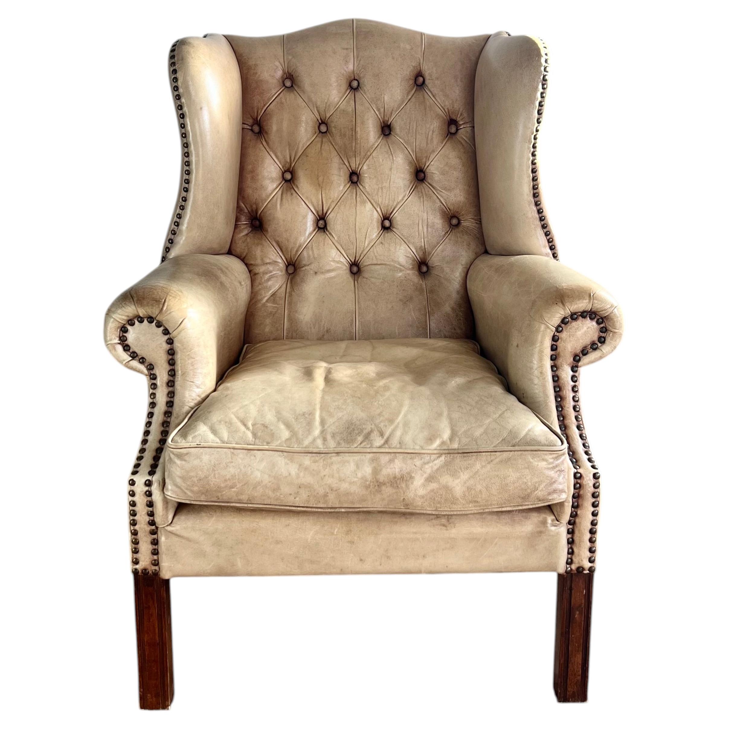 Upholstered Leather Armchair With Ears - Circa 1880 For Sale