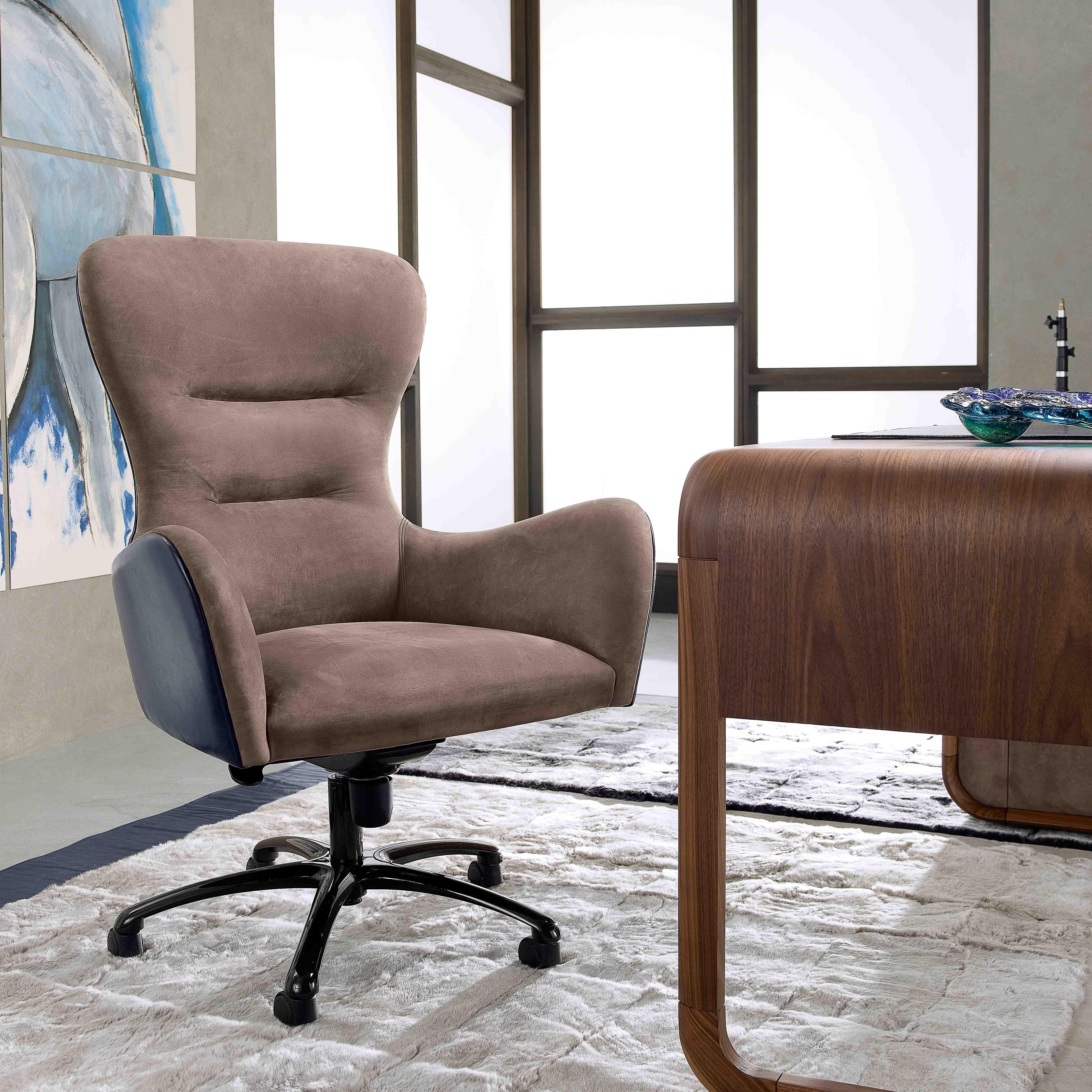 The elegant Gianpier office chair swivel combines a welcoming silhouette, superb upholstery and a mid-century-inspired structure. This armchair will be a standout piece when displayed in an office or any other contemporary space that needs special