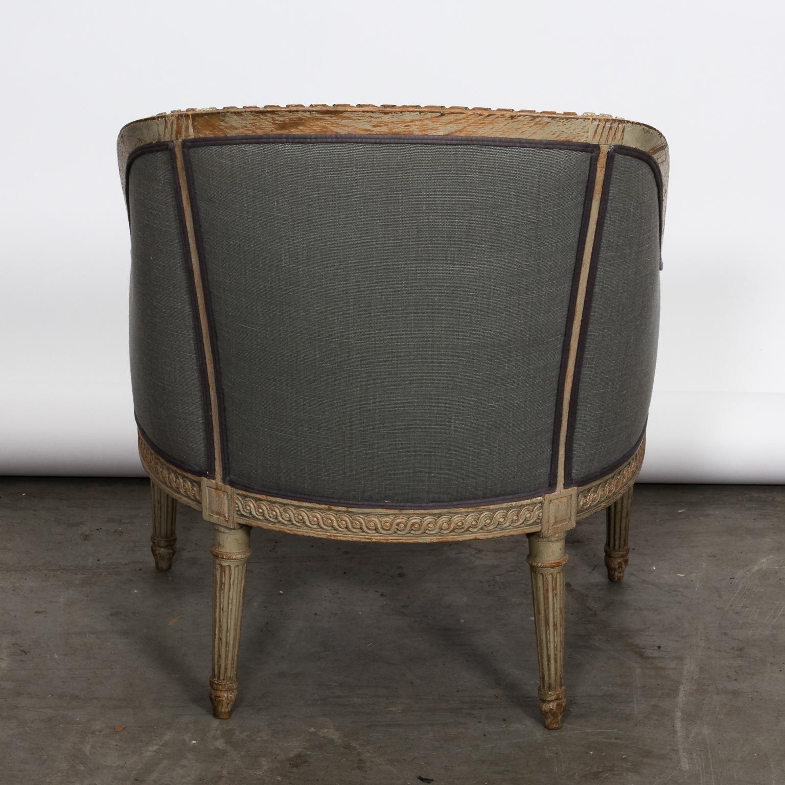 Wood Upholstered Louis XVI Style Bergère Armchair For Sale