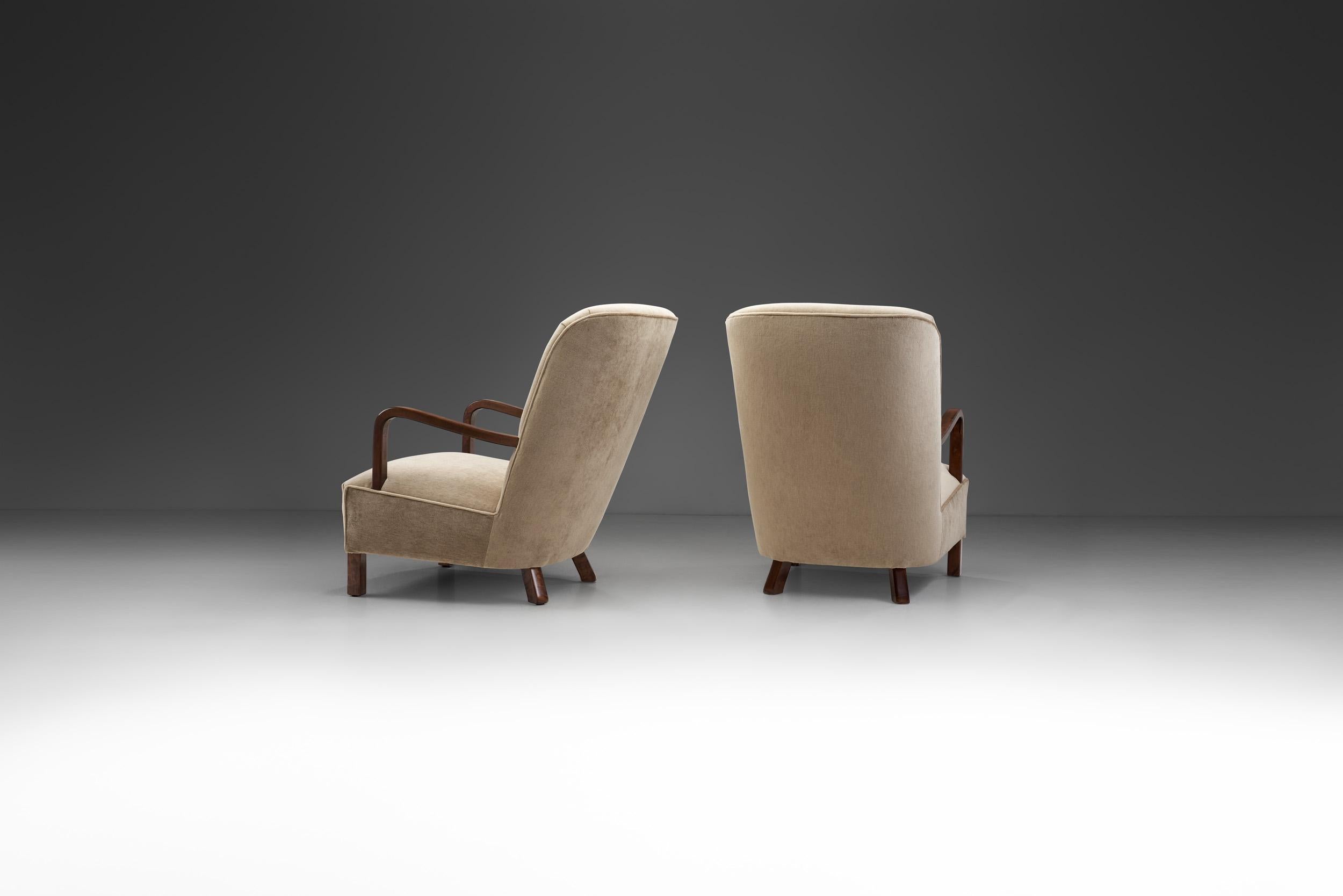 European Upholstered Lounge Chairs with Sculptural Arms, Europe ca 1940s For Sale