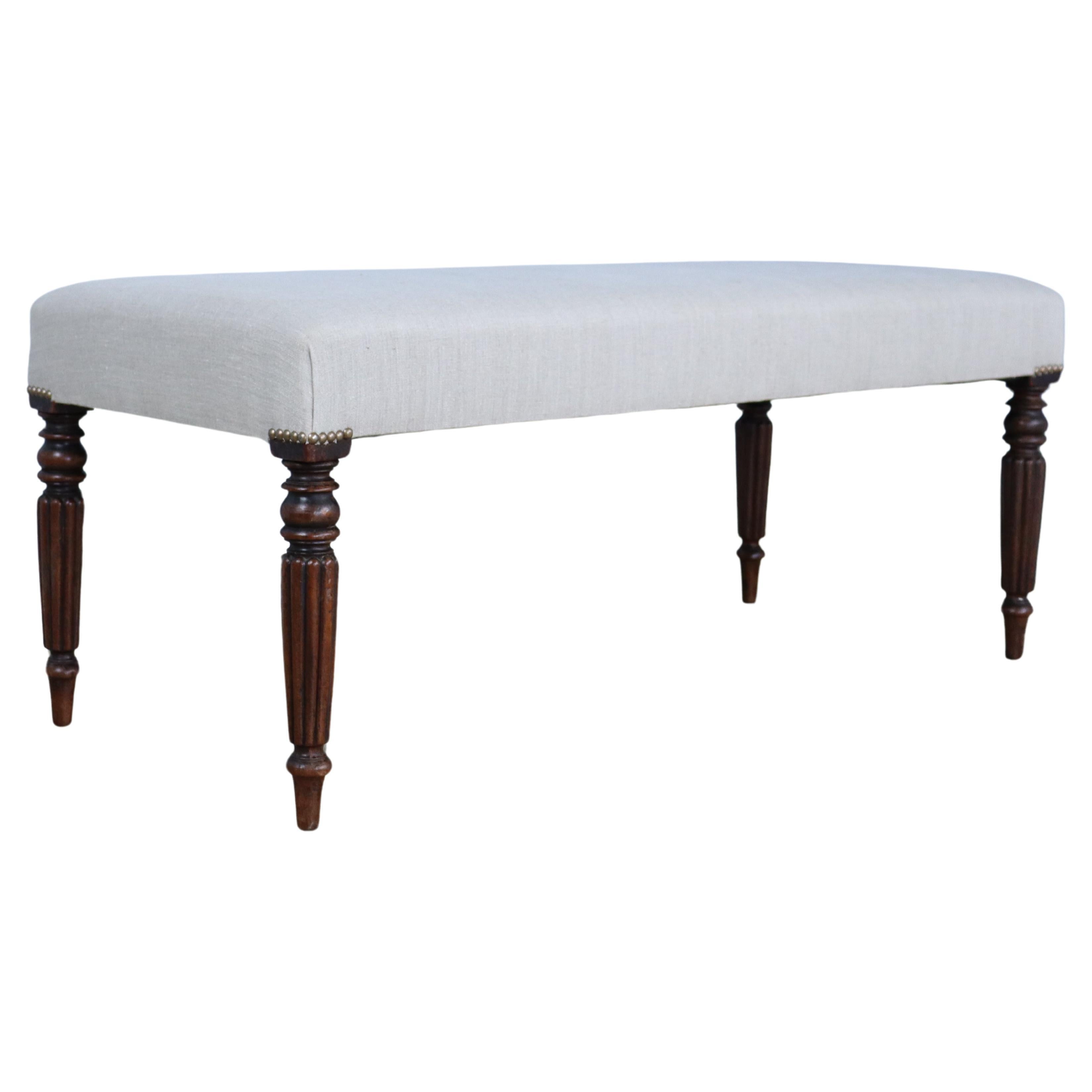 Upholstered Mahogany Bench with Fluted Legs For Sale