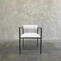 Silla de centro de metal tapizada