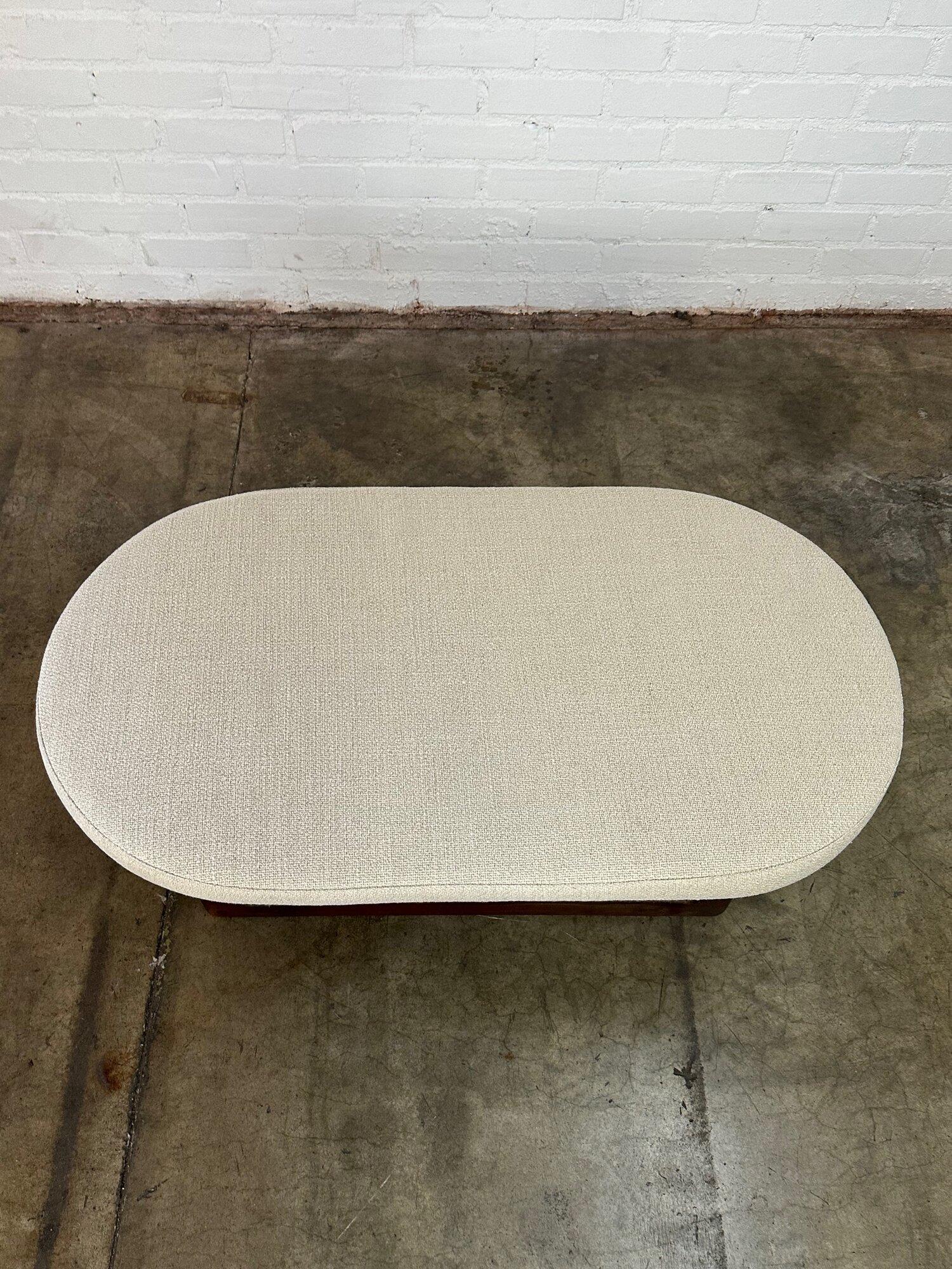 Upholstery Upholstered racetrack coffee table handcrafted For Sale