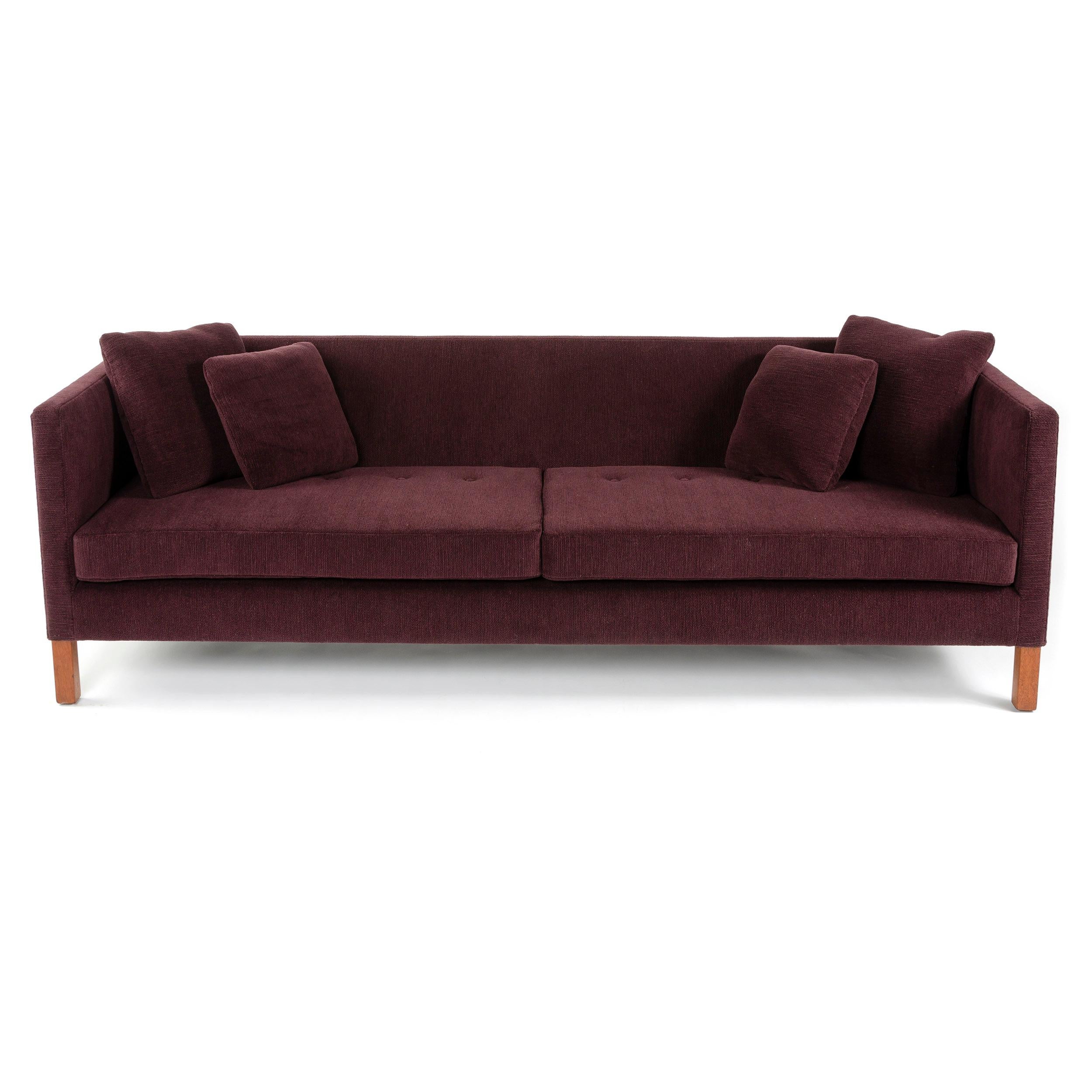 A Dunbar square arm sofa designed by Edward Wormley with two slab seat cushions and four pillows. Newly reupholstered in a burgundy wool chenille.