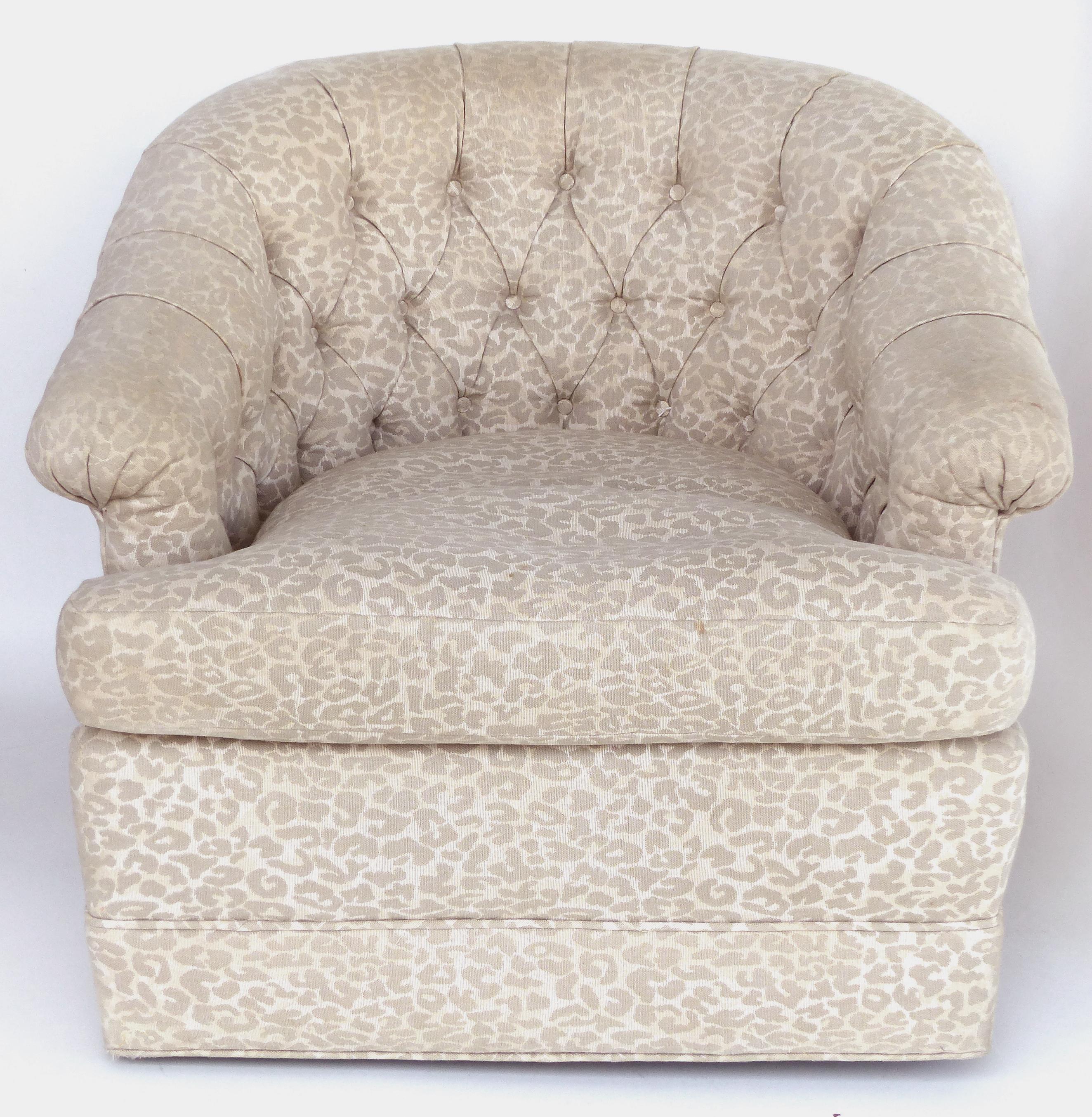 Upholstered Swivel Club Chairs with Tufted Backs, Pair

Offered for sale is a pair of swivel chairs with tufted backs and animal print upholstery. These comfortable chairs are sturdy and swivel nicely but re-upholstering is suggested as the fabric