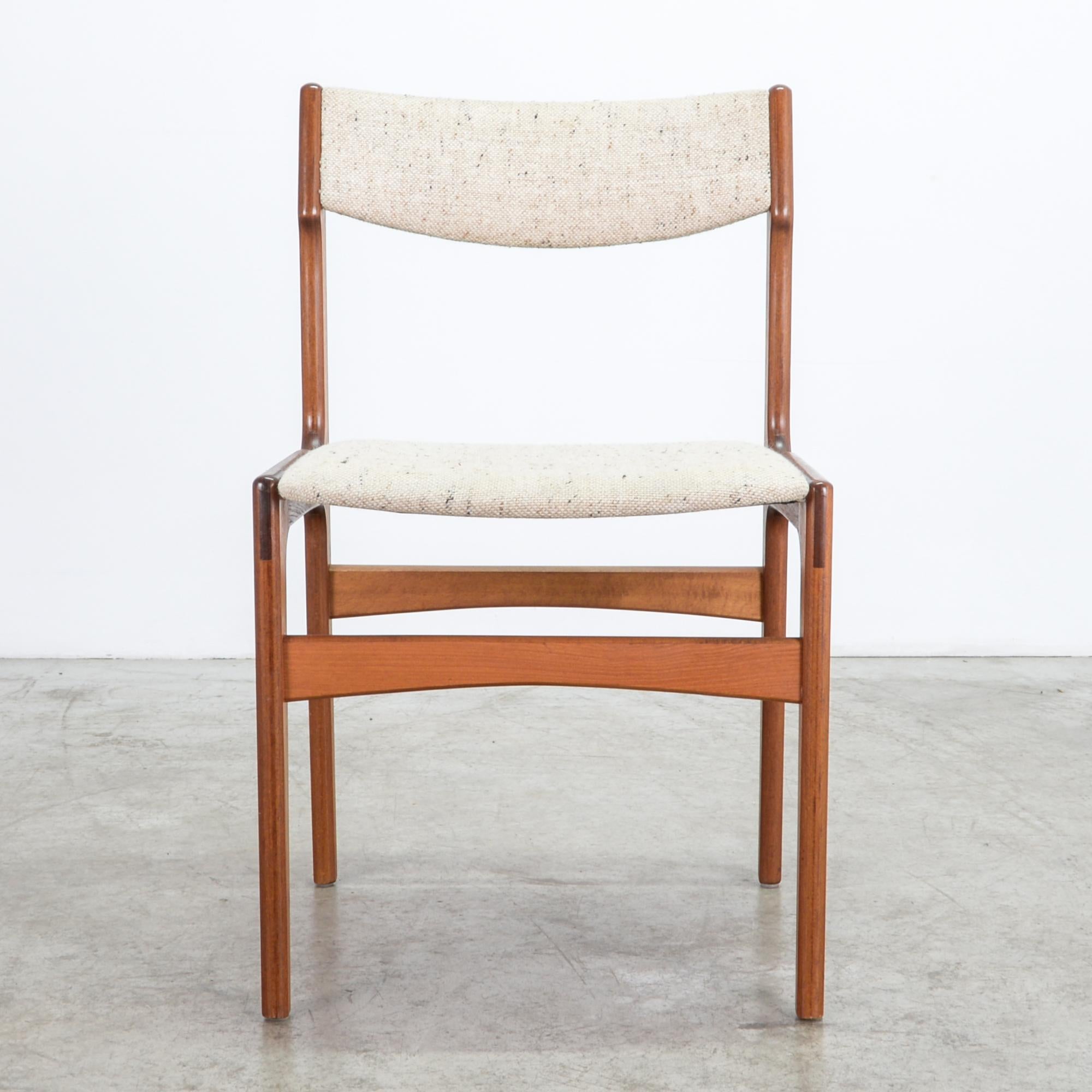 From Denmark circa 1960, these simple and finely crafted chairs are sleek and inviting. Updated with a cotton-linen-polyester upholstery fabric, with great natural texture and easily cleaned. A characteristic mid-20th century design features clean