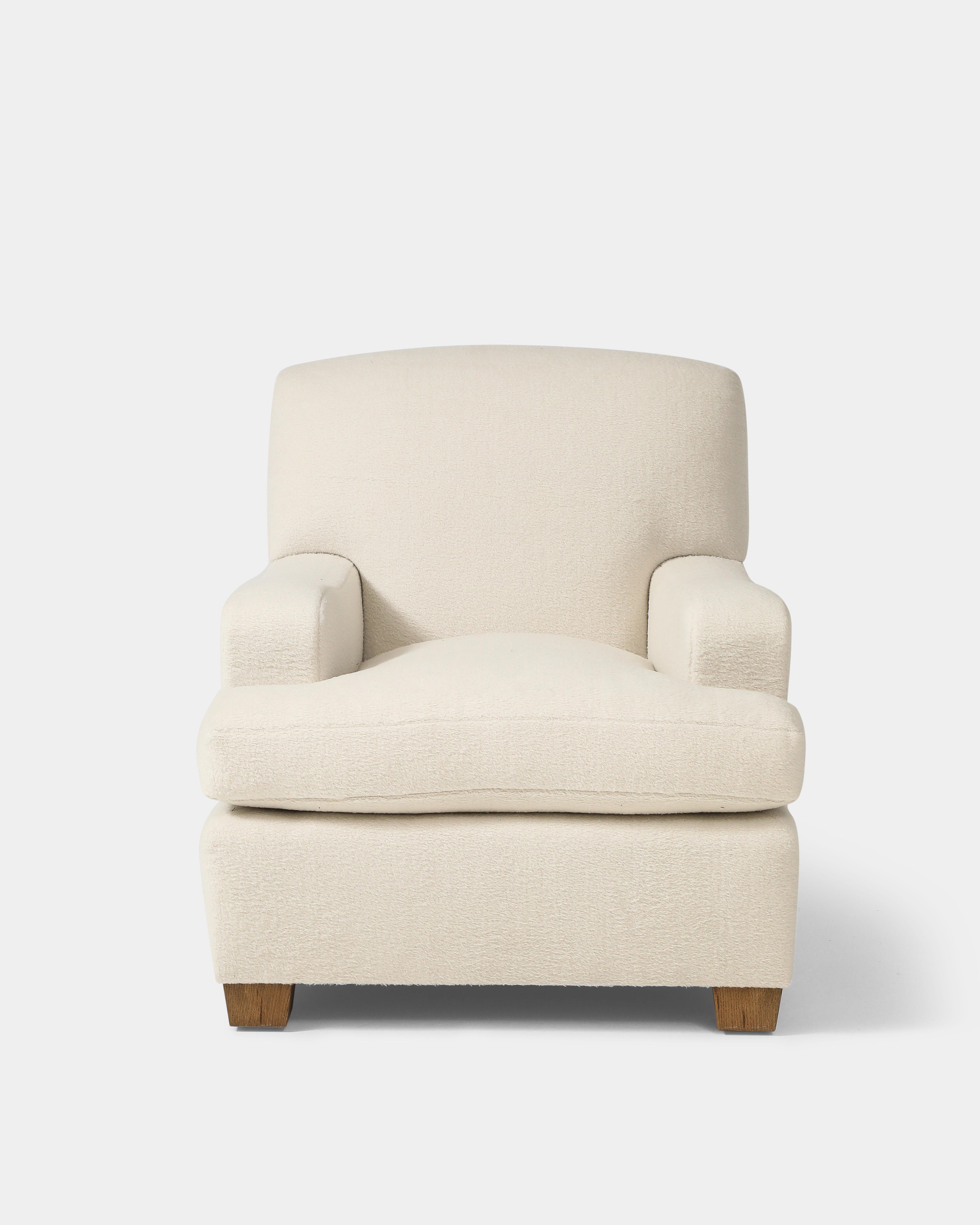 Armchair with solid wood frame, made and upholstered in New York. The price listed is for COM upholstery, and the lead-time is 8-10 weeks.

NOTE: Customer must provide their own fabric. Lead time for this chair is 8-10 weeks. 

H 31 x W 31 x D 36