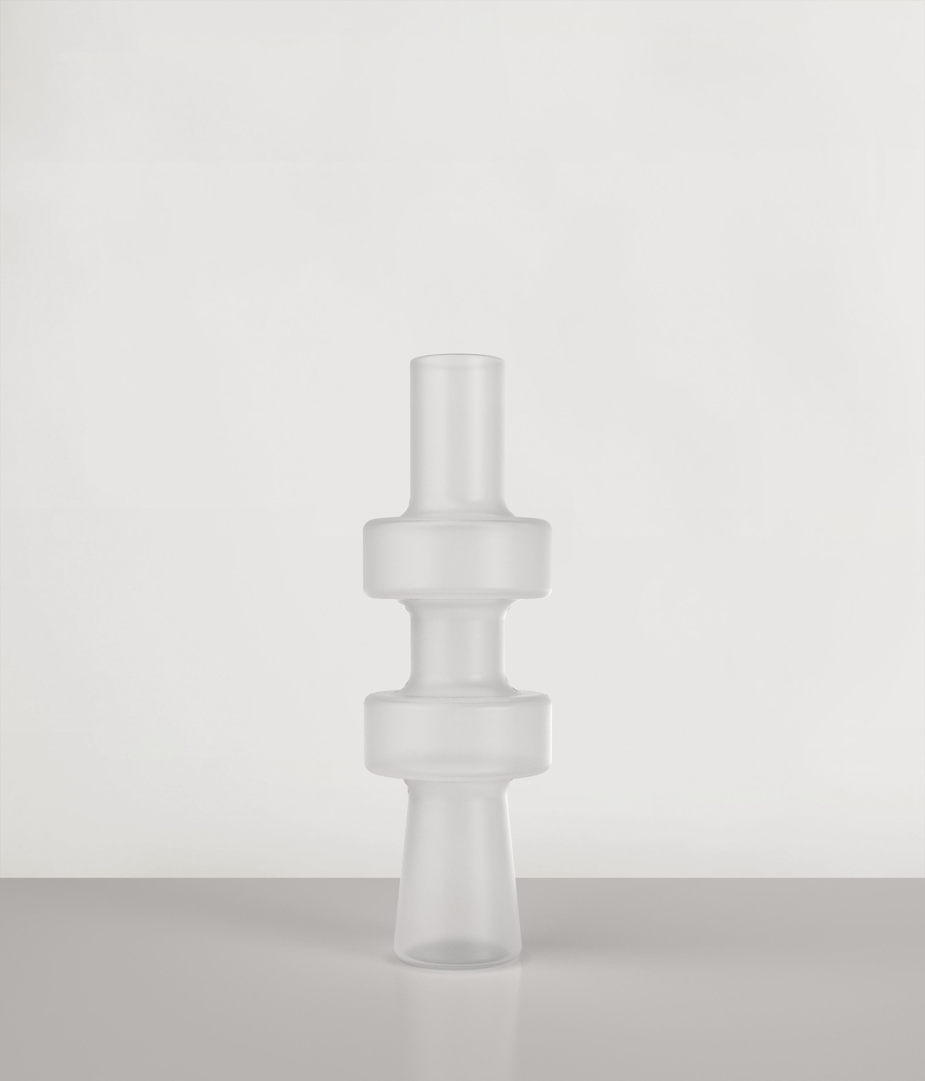 Uppa V2 vase by Edizione Limitata
Limited Edition of 1000 pieces. Signed and numbered.
Dimensions: D12 x H38 cm
Materials: sanded glass

Uppa is a series of 21st Century sculptural vases made by Italian artisans in blown sanded glass. The piece is