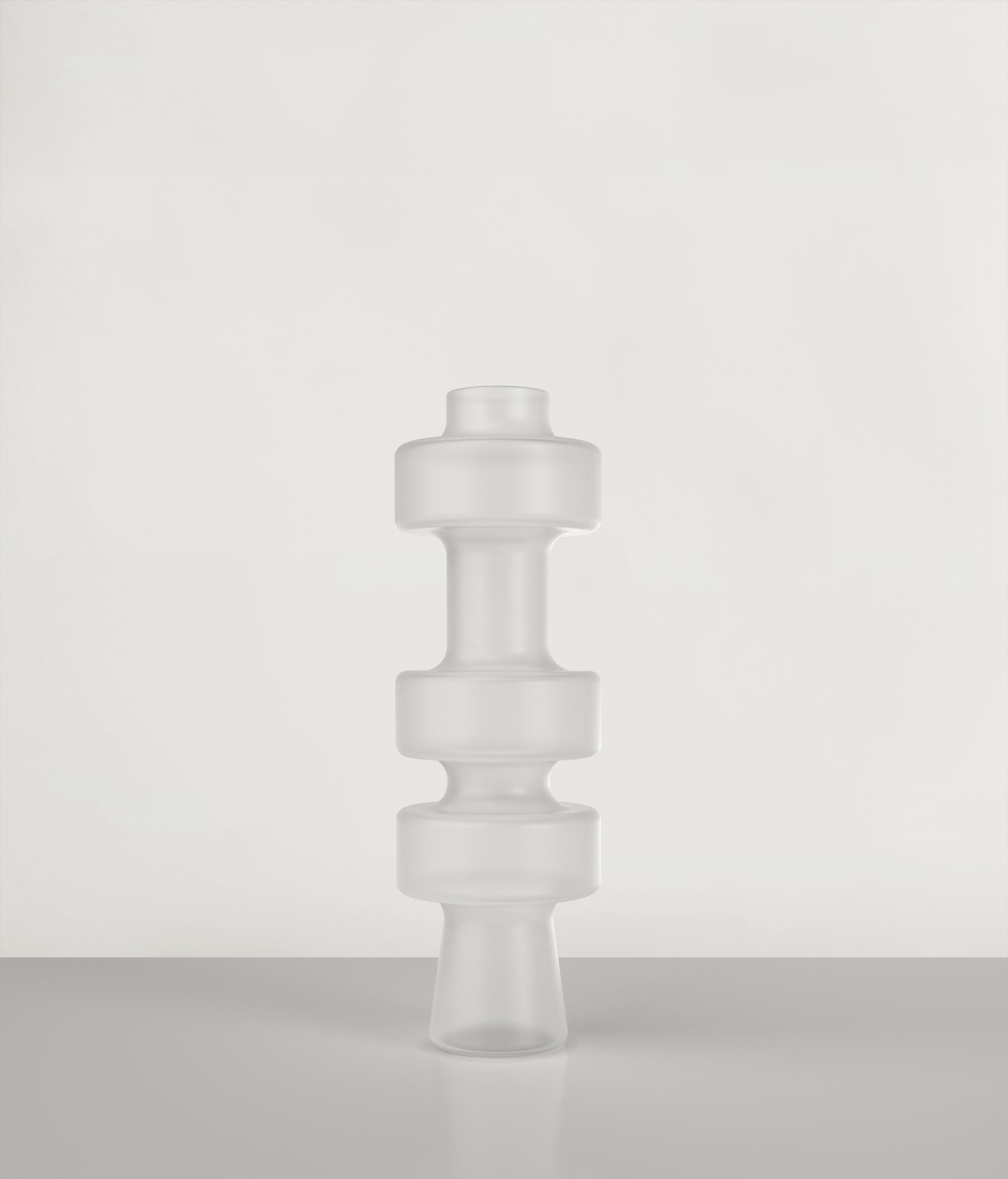 Uppa V3 vase by Edizione Limitata
Limited Edition of 1000 pieces. Signed and numbered.
Dimensions: D12 x H38 cm
Materials: sanded glass

Uppa is a series of 21st Century sculptural vases made by Italian artisans in blown sanded glass. The piece is