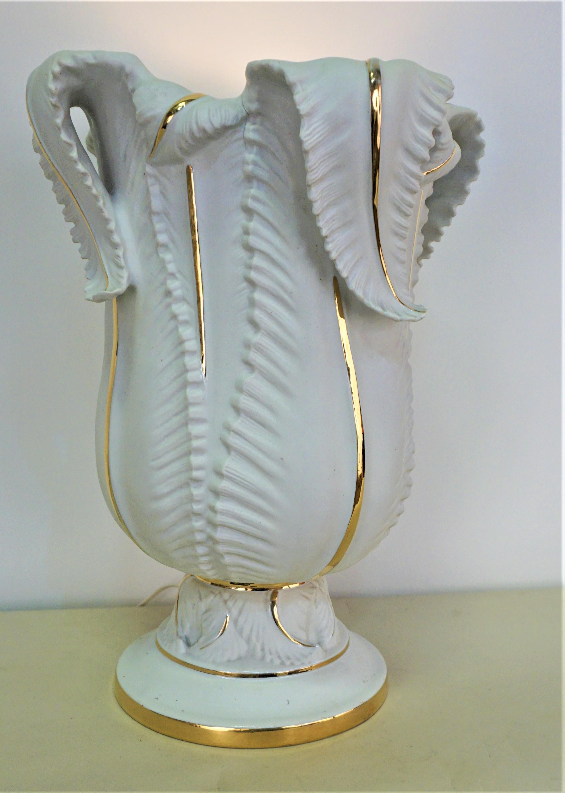 Large 1950's upright porcelain leaf design able lamp.
Limited edition Limoges.