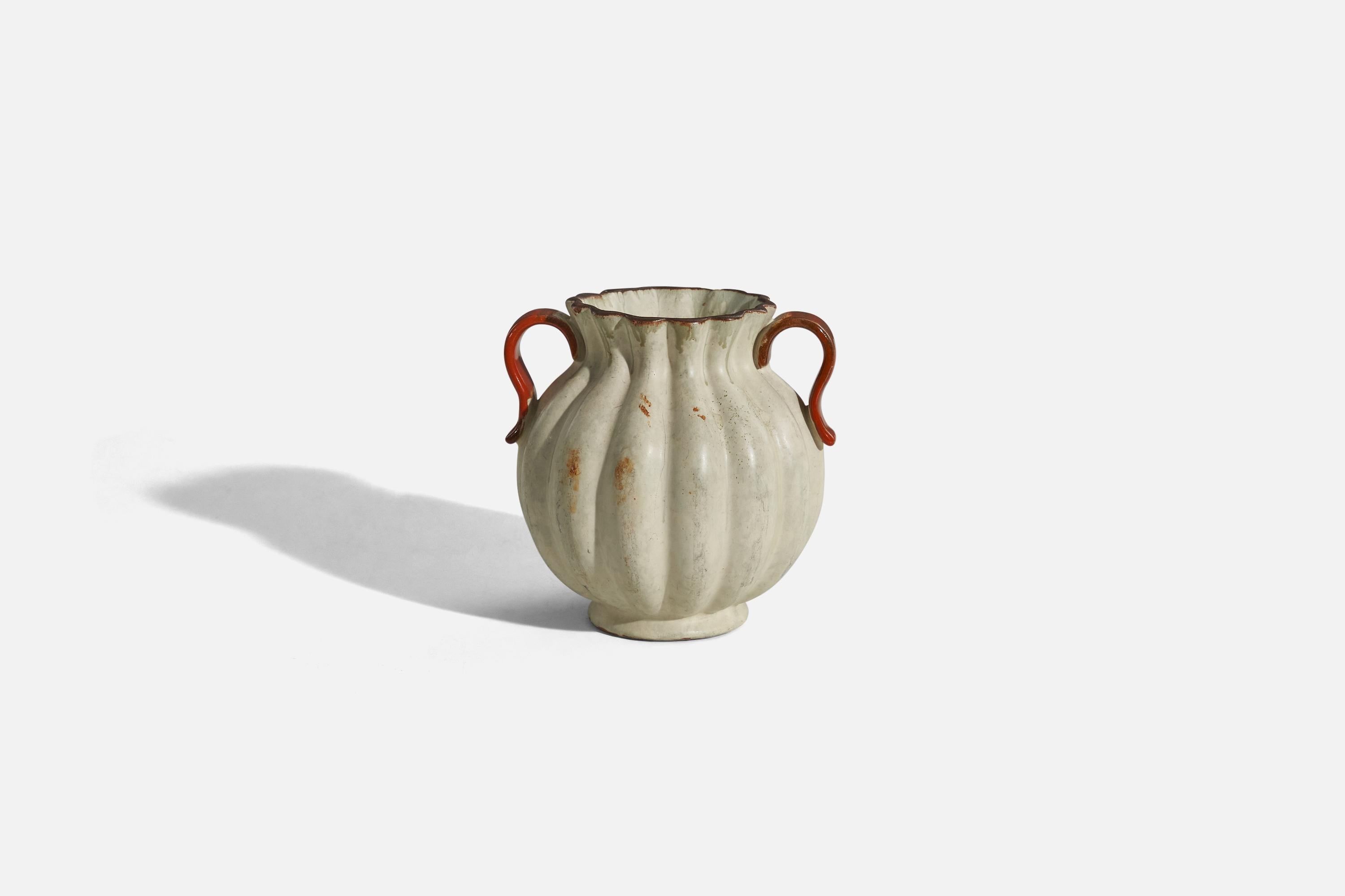 A beige and red glazed earthenware vase designed and produced by Upsala-Ekeby, Sweden, 1940s.

